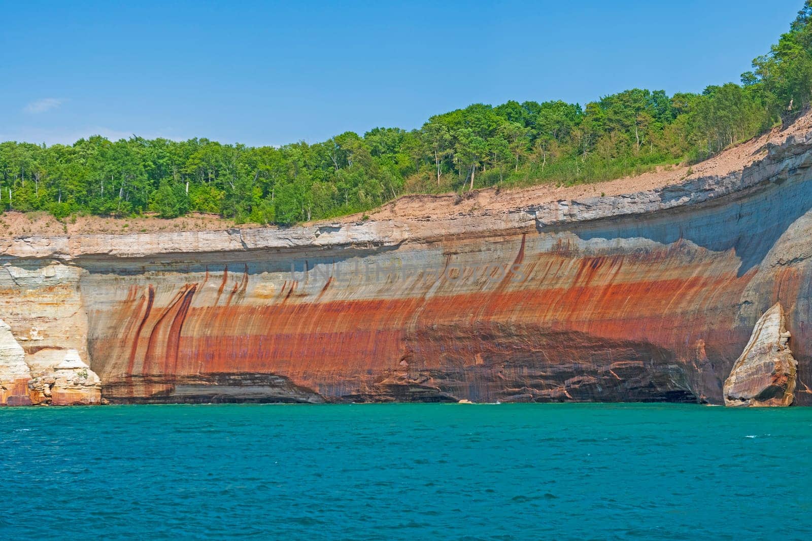 Red Cliffs Above Blue Waters on the Pictured Rocks National Lakeshore in Michigan