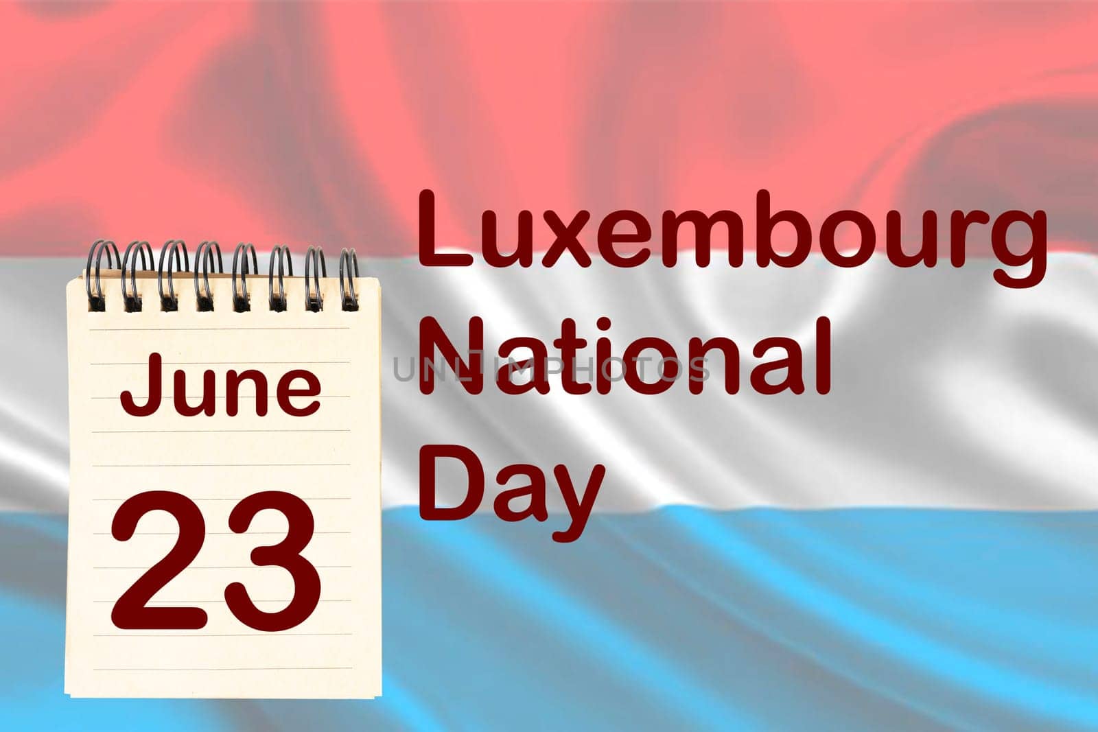 The celebration of the Luxembourg National Day with the flag and the calendar indicating the June 23