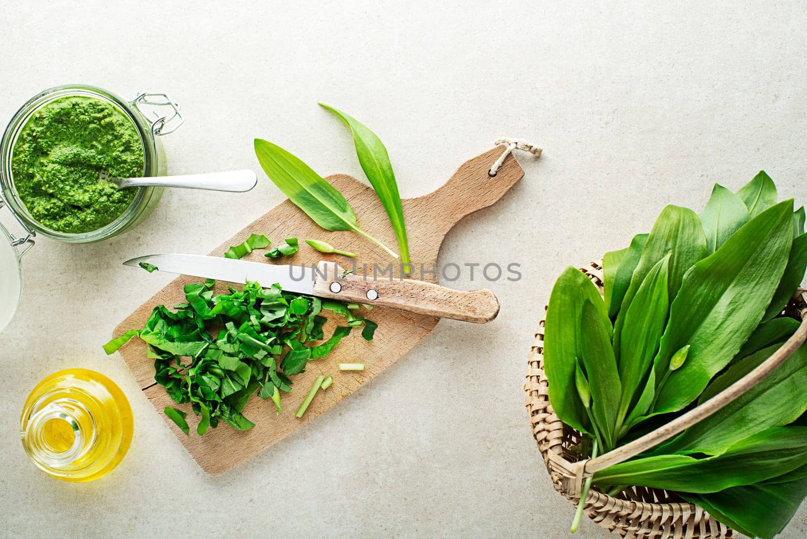 Making Fresh ramson or wild garlic pesto. Healthy spring food concept