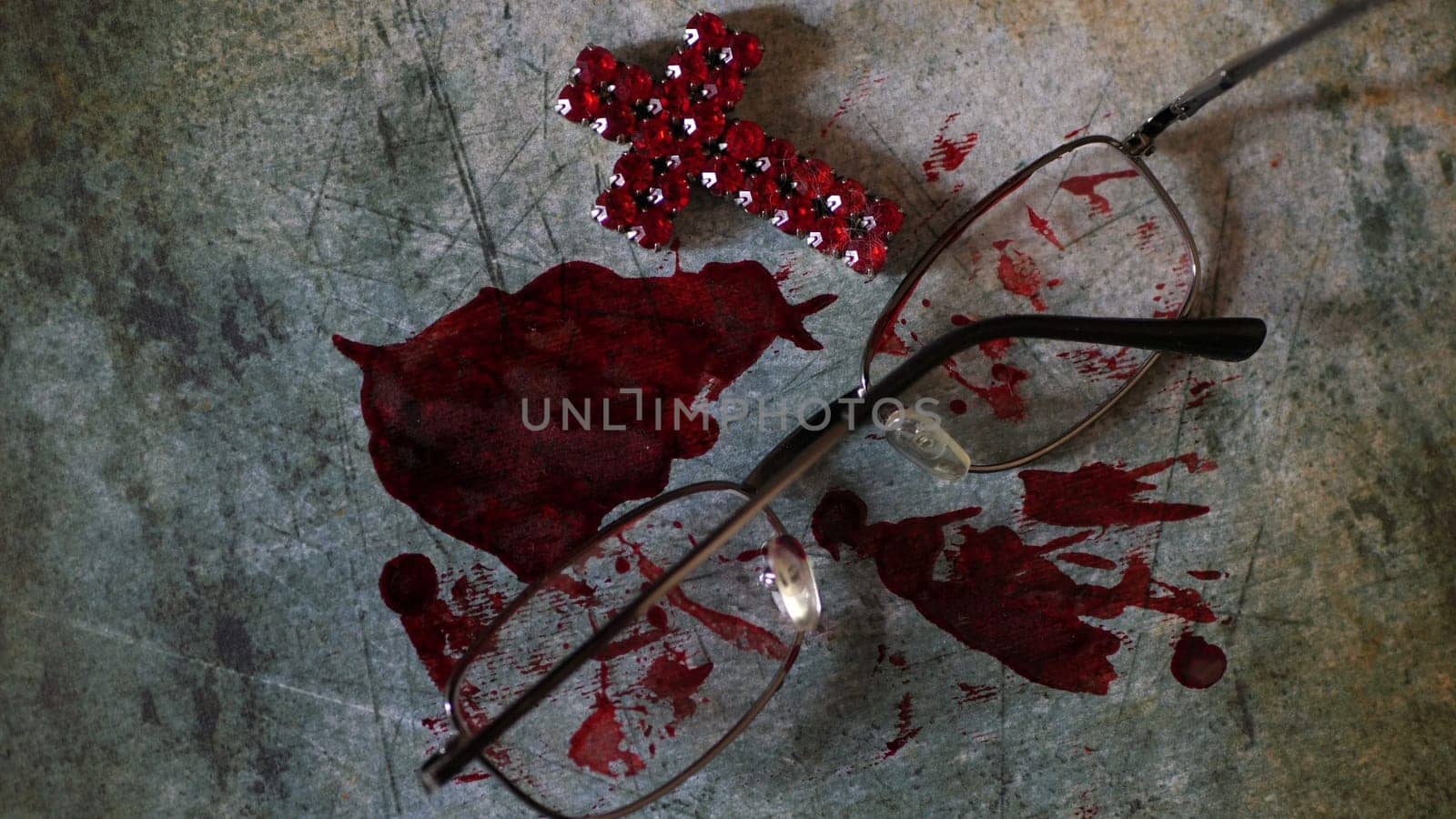 Close up of cross of jesus on bloody grunge background