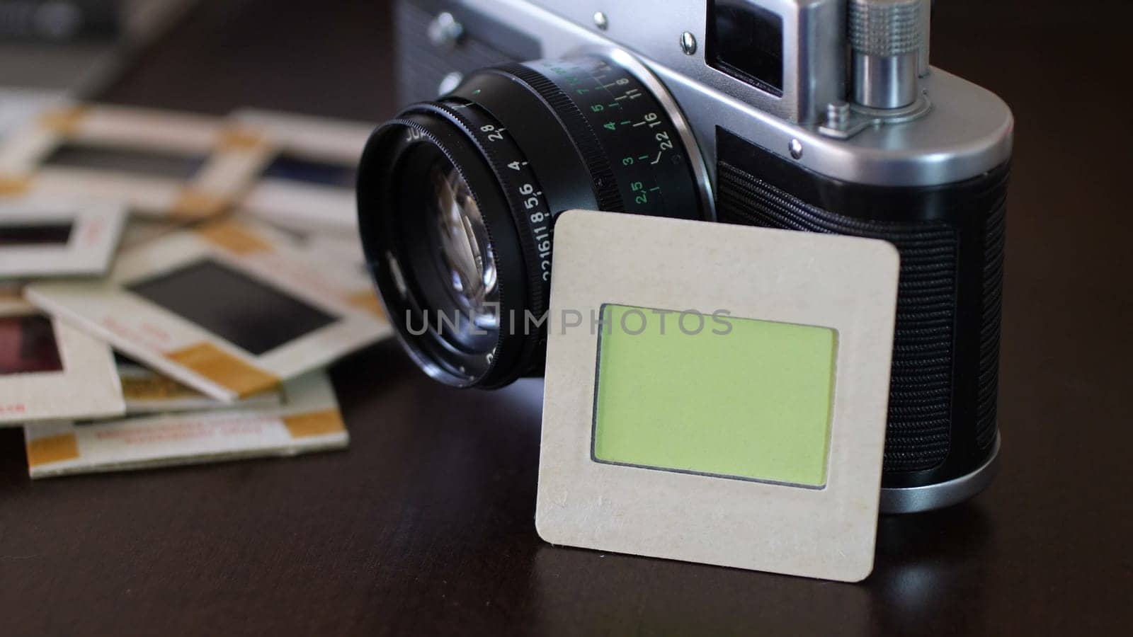 Vintage film camera and slide film