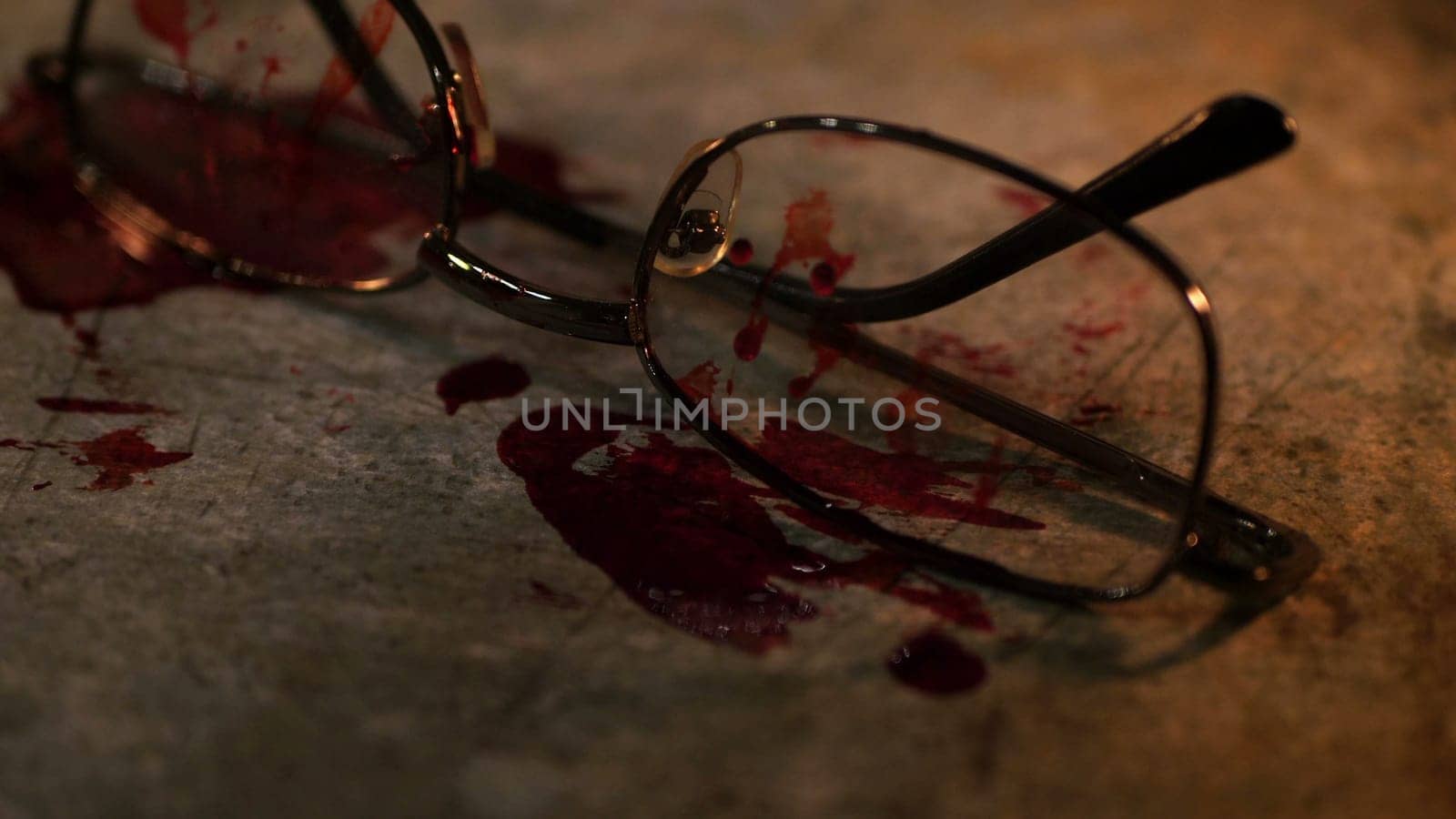Grungy conceptual crime scene with blood and glasses
