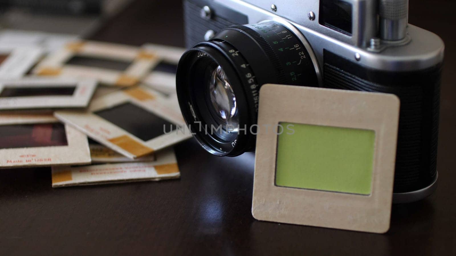 Close up of vintage film camera and slide films