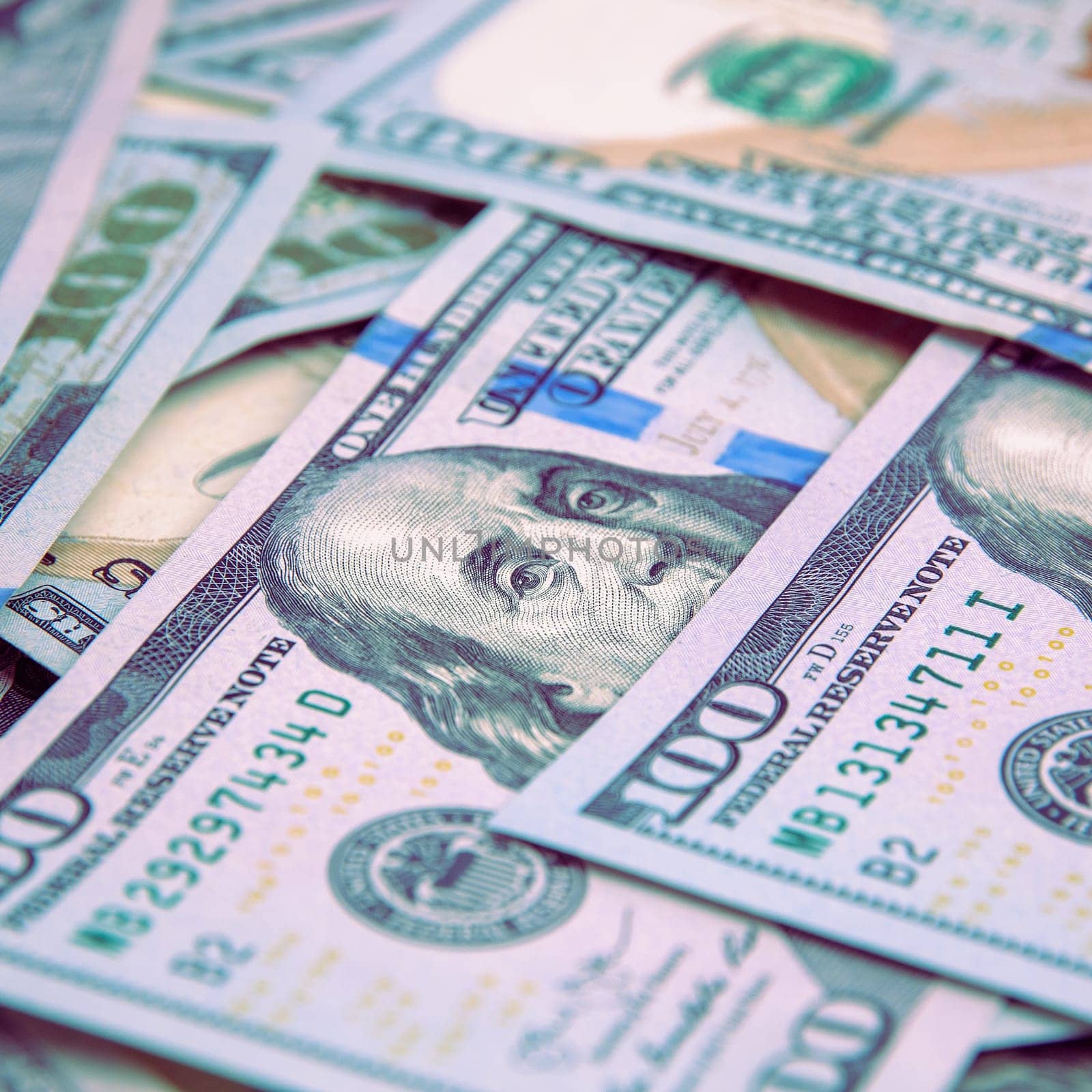 A hundred American banknotes are scattered. cash hundred-dollar bills, dollar background image.