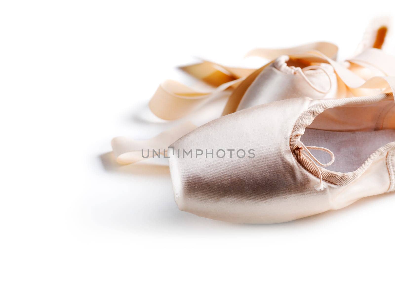 Pointe shoes isolated over white background