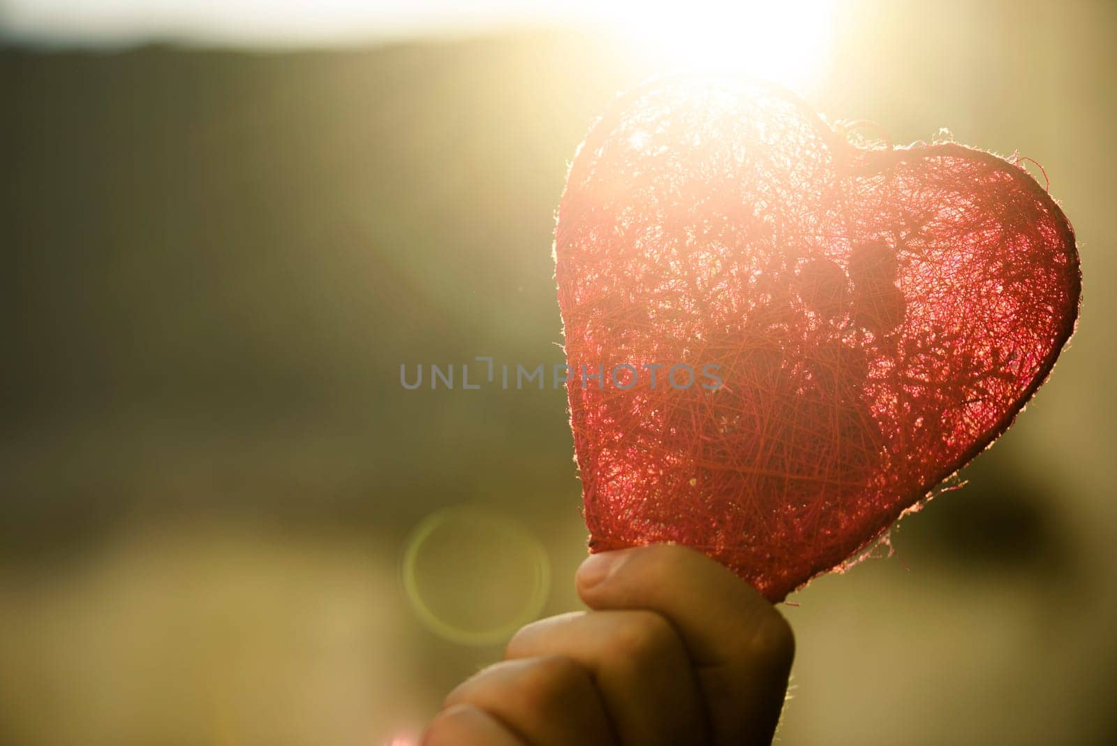 Red valentine heart in hand