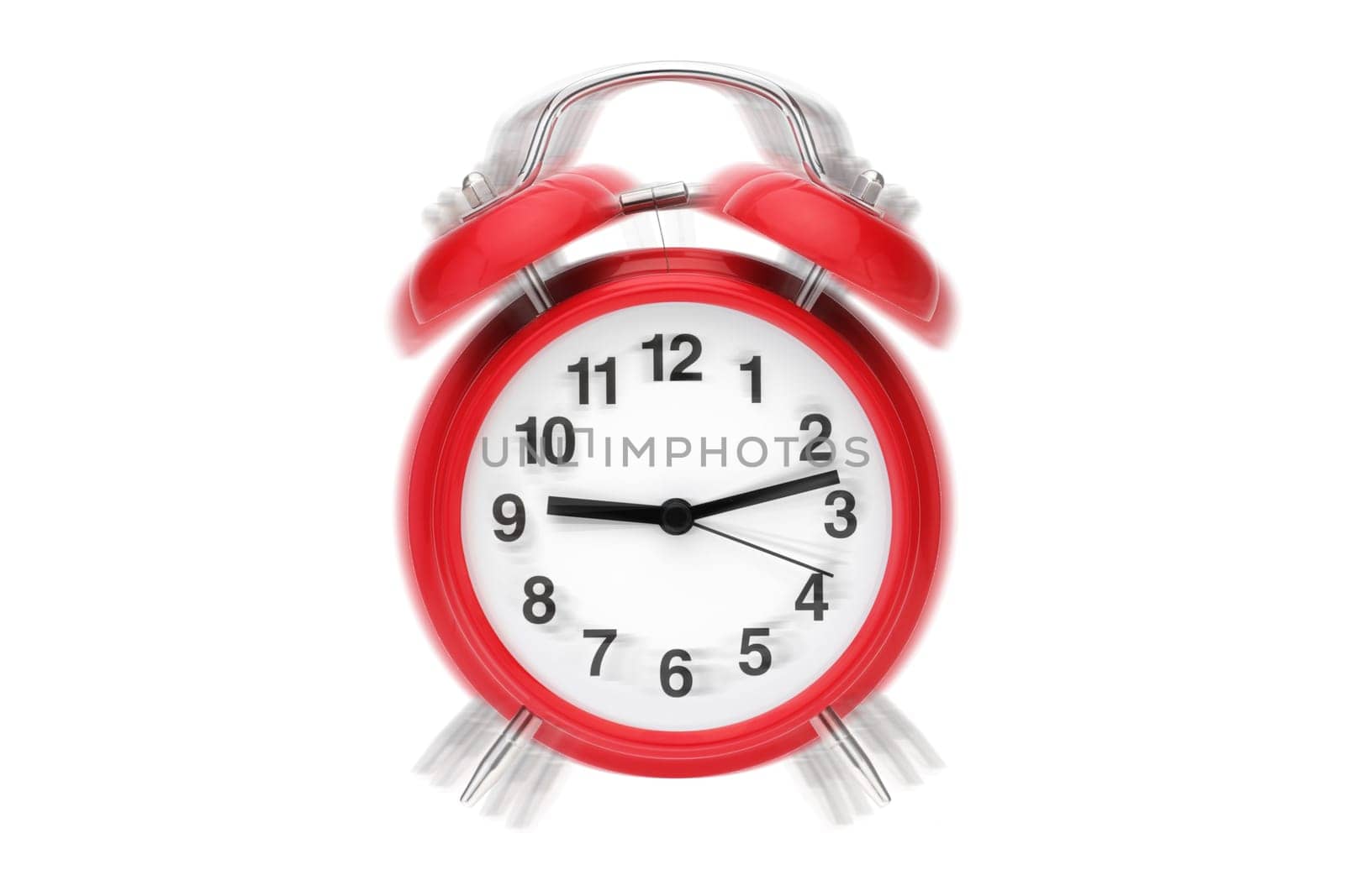 A ringing alarm clock. Red retro alarm clock on white with ringing effect