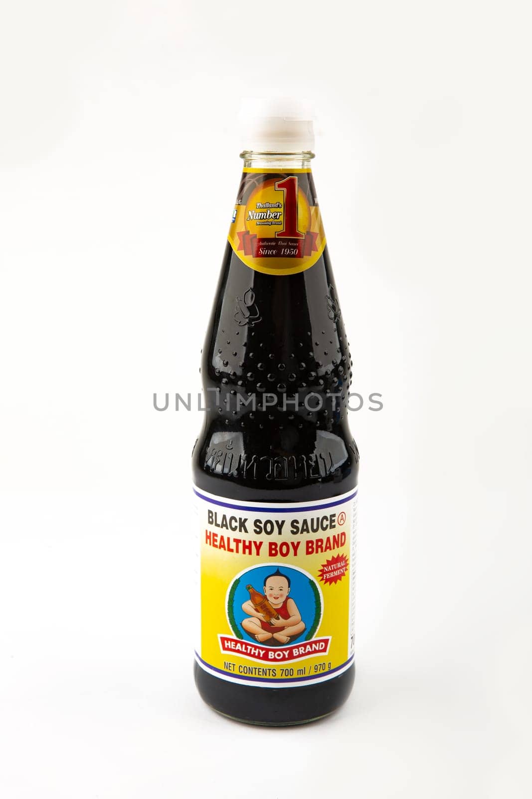 WETZLAR, GERMANY - 2022-04-05: Bottle of Black Soy Sauce Healthy Boy Brand over white Background. Its Thailand's Number One since 1950.