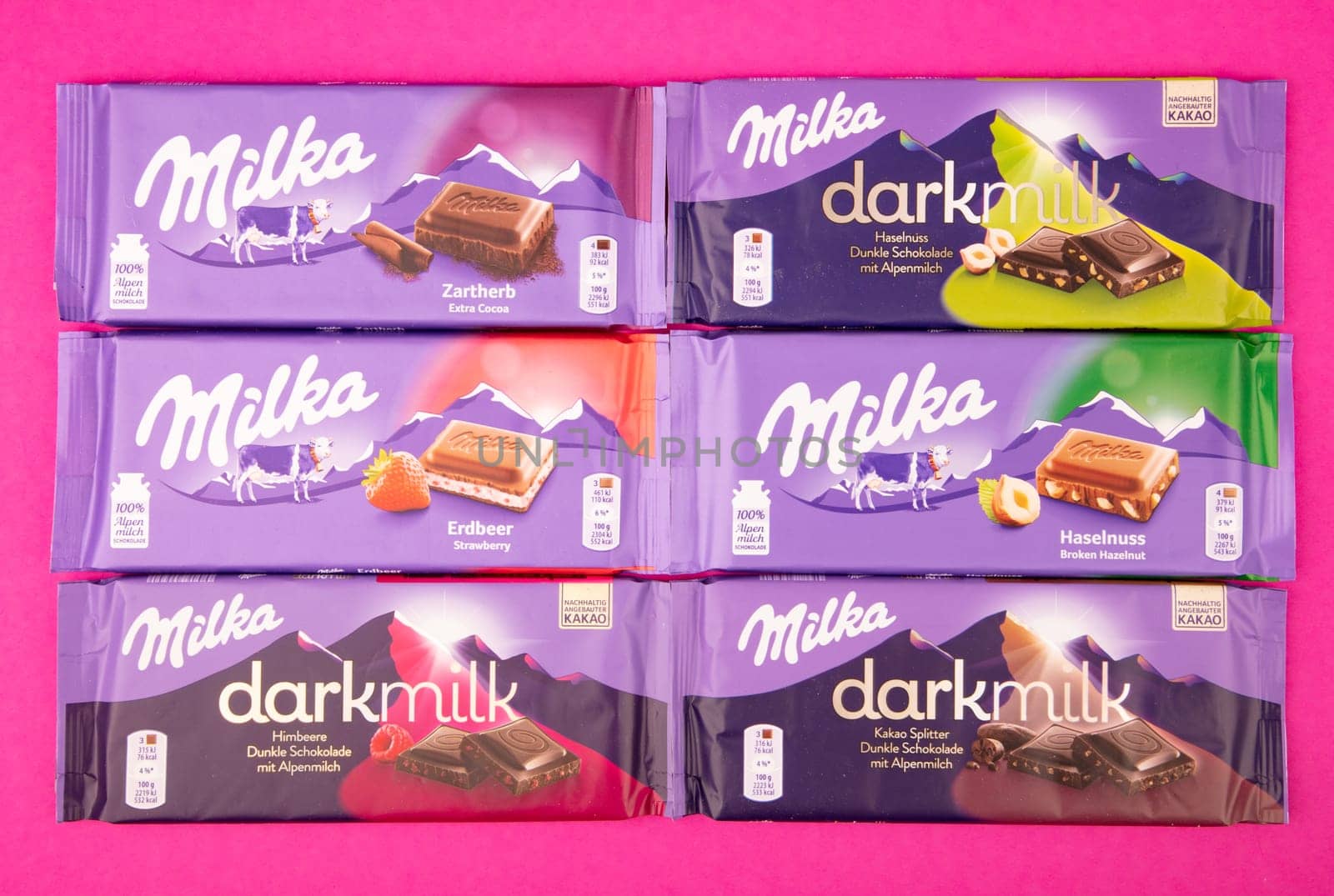 WETZLAR GERMANY - 2022-04-11: Milka chocolate bar on purple background. Milka milk chocolate bar. Milka is a brand of chocolate confection which originated in Switzerland in 1901.