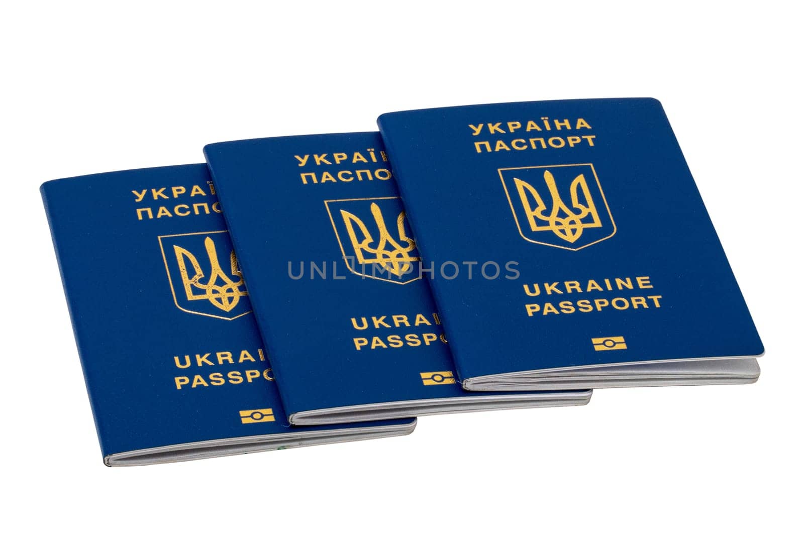 Three passports of Ukrainian citizens or migrants for visa-free travel to the European Union isolated on a white background. Clipping path. Refugees in the Ukraine conflict with Russia.
