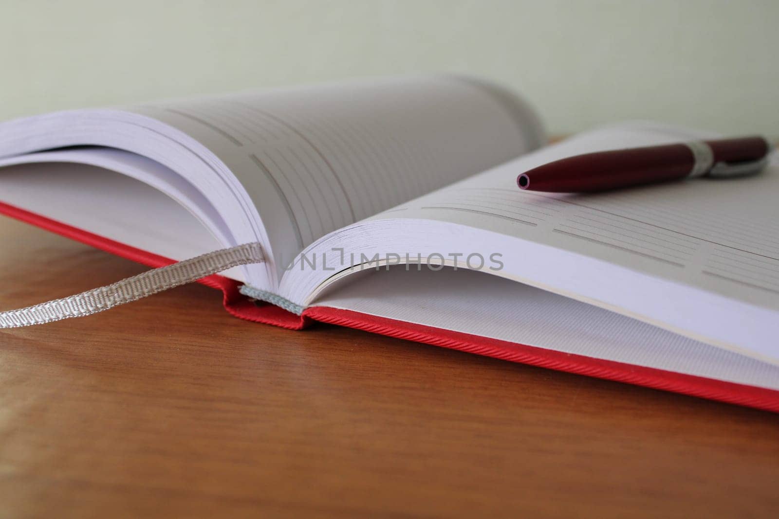 Office desk, workplace with notebook, pen. Business background..
