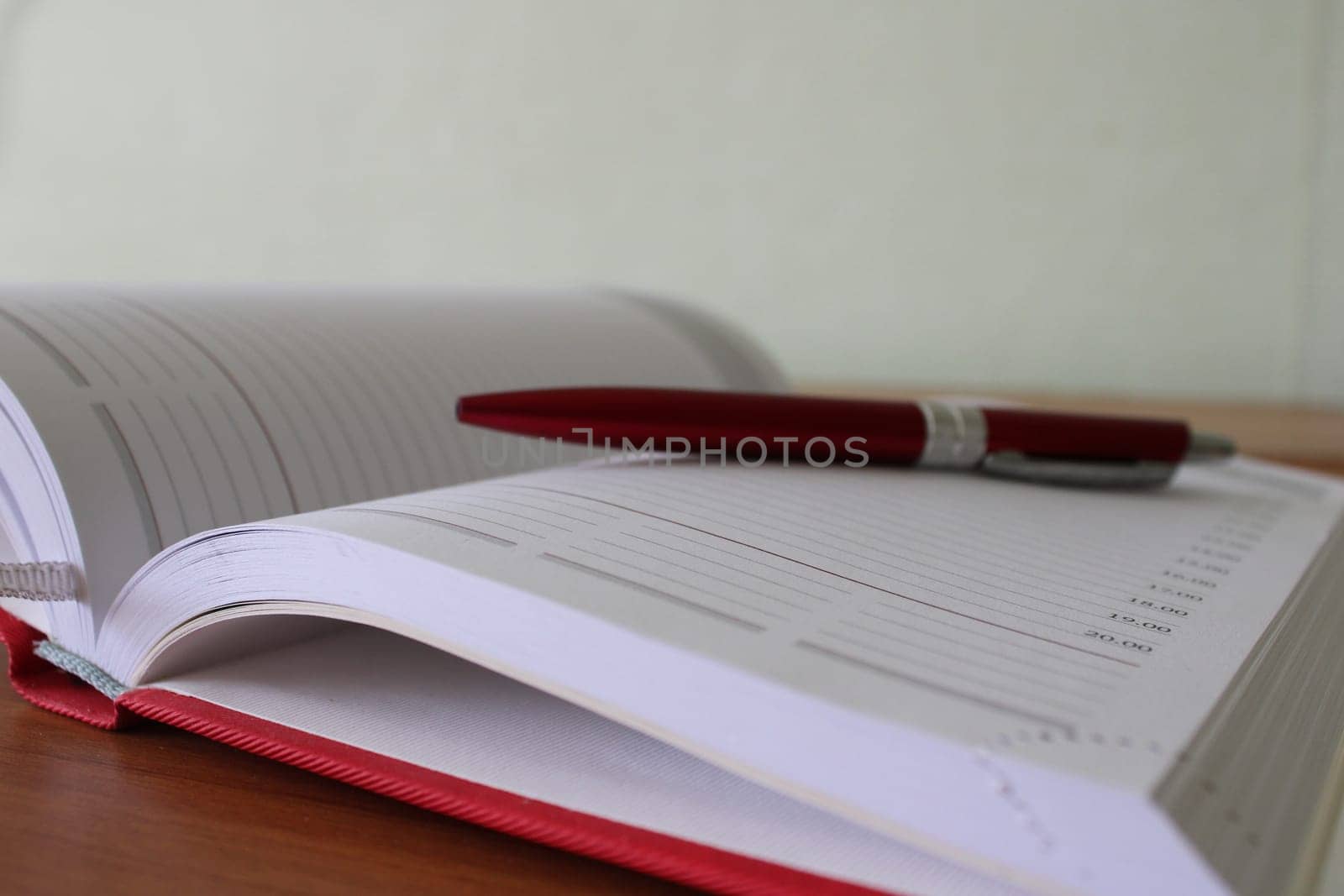 Office desk, workplace with notebook, pen. Business background..
