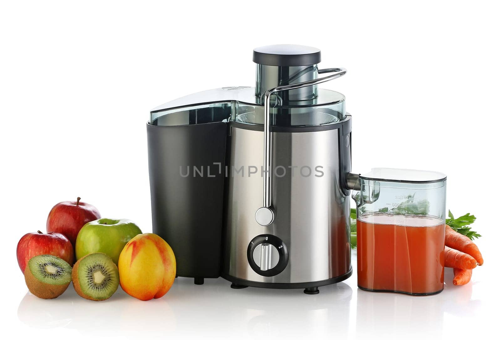 Electric juicer with fruits isolated on white background