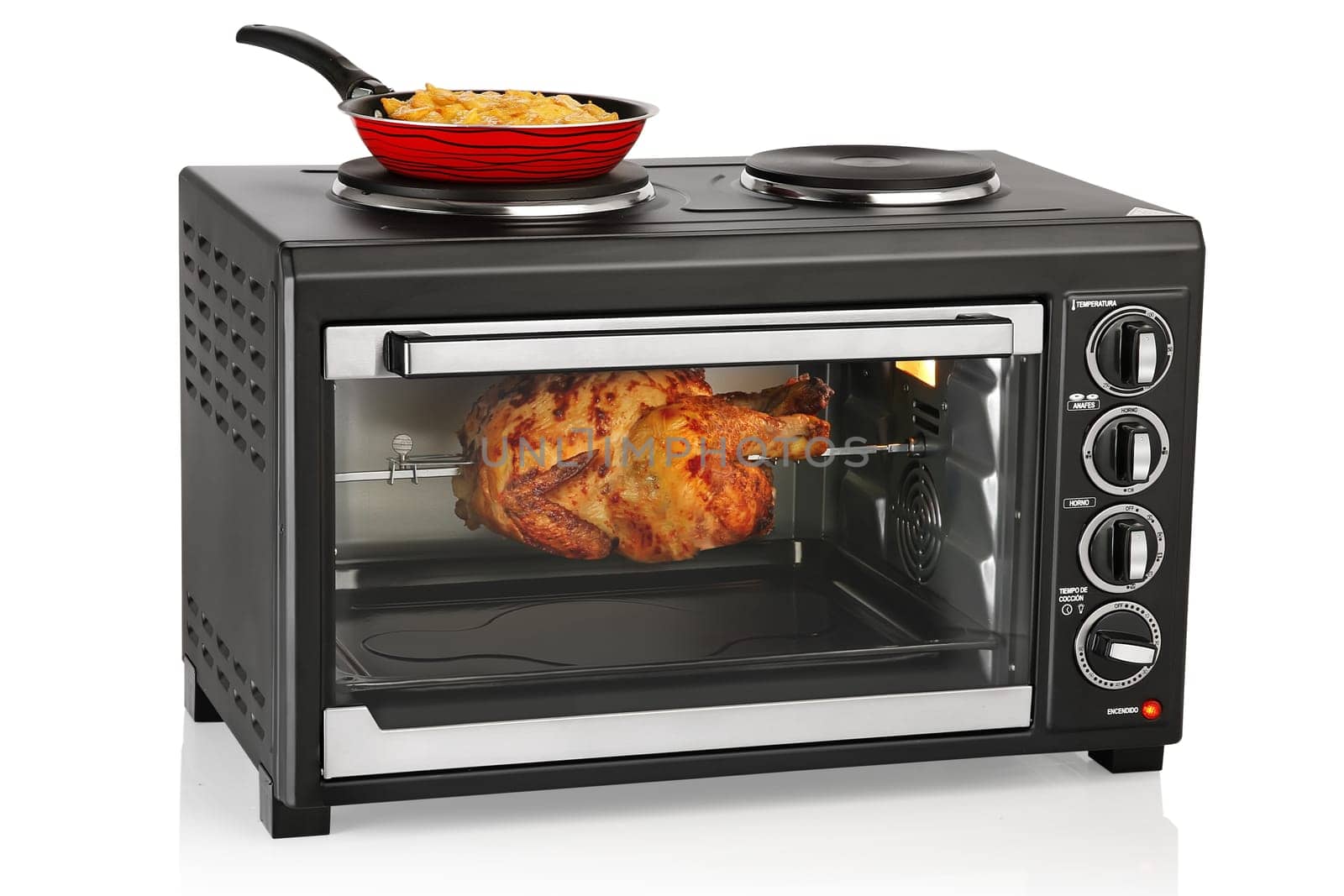 Electric oven over white background