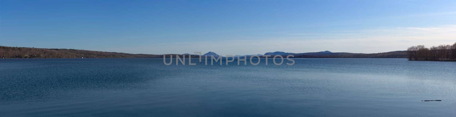 Memphremagog lake panorama water mountains and sky landscape Estrie Eastern Townships Magog Quebec Canada
