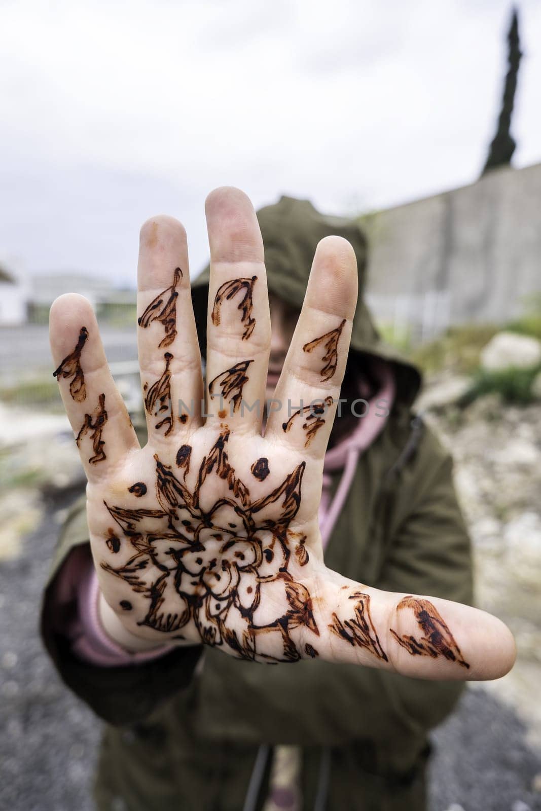 Detail of arabic decoration on the hands, temporary tattoo