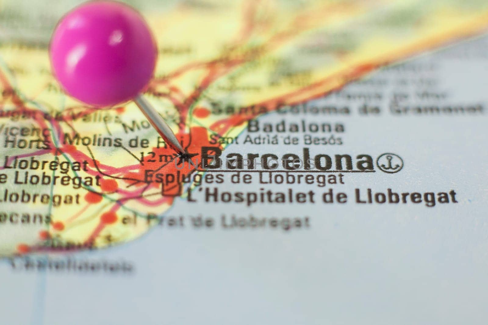Pushpin marking on Barcelona, Spain. Selective focus on city name