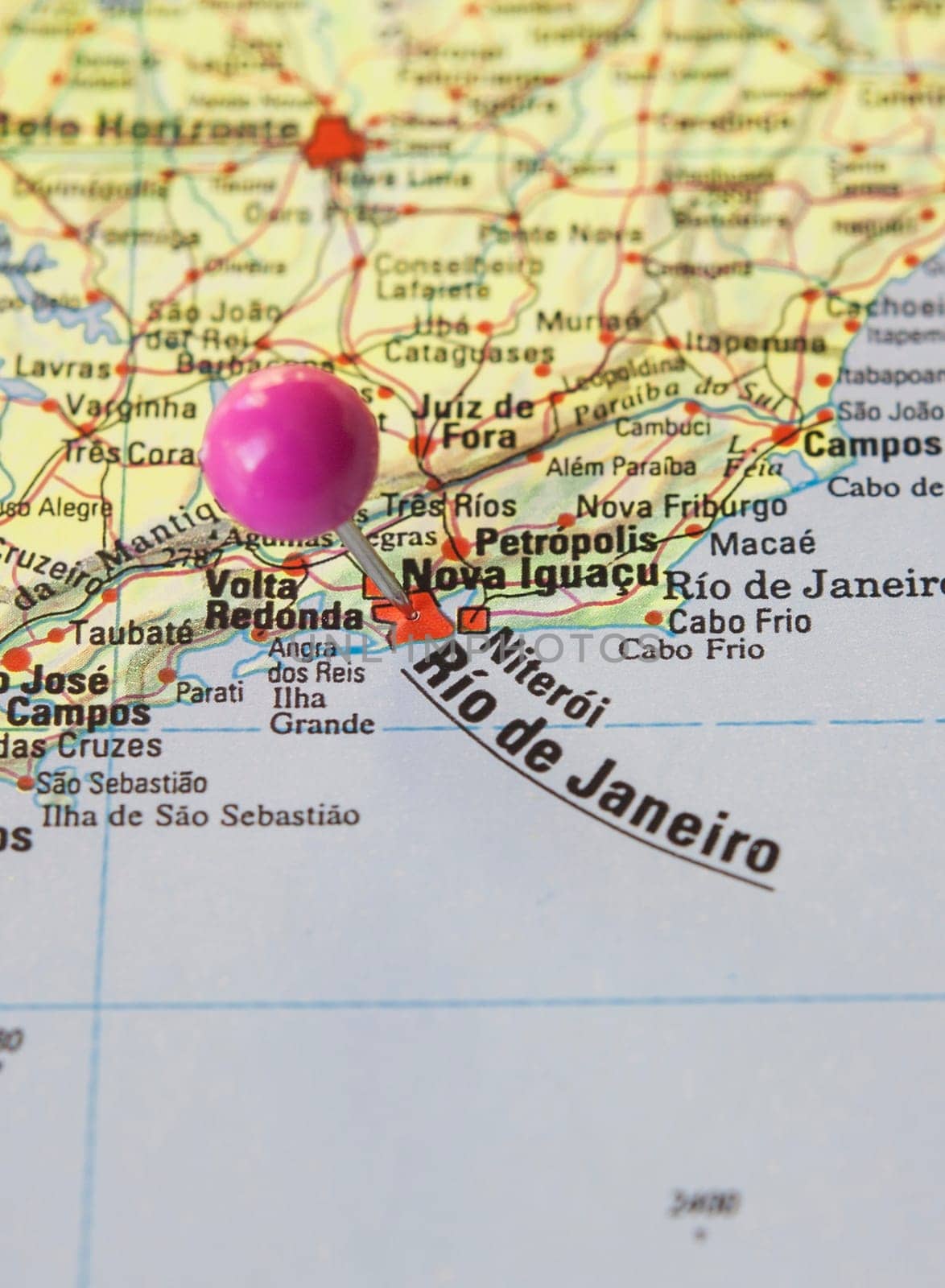 Pushpin marking on Rios de Janeiro, Brazil. Selective focus on city name