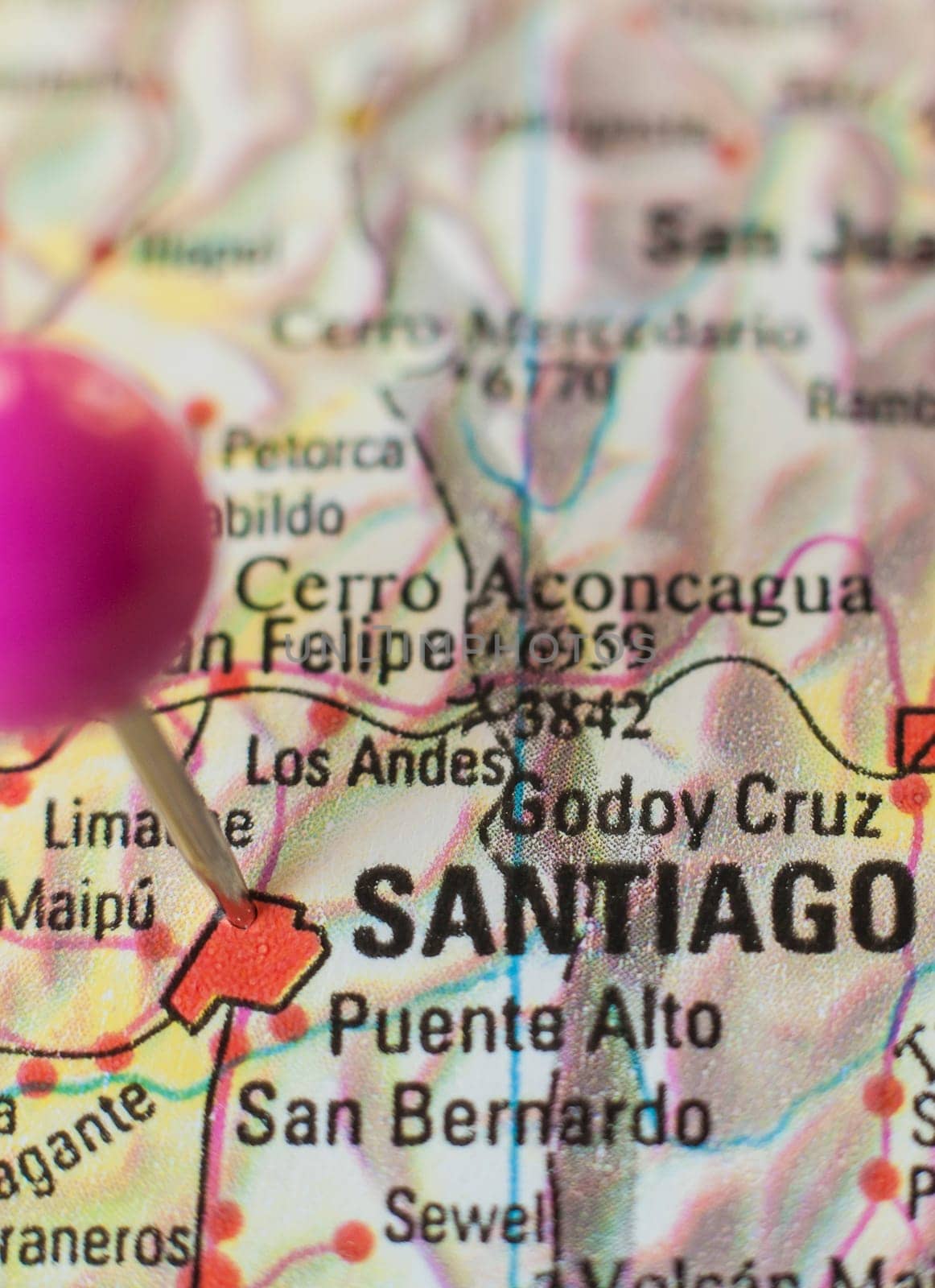 Pushpin marking on Santiago de Chile. Selective focus on city name