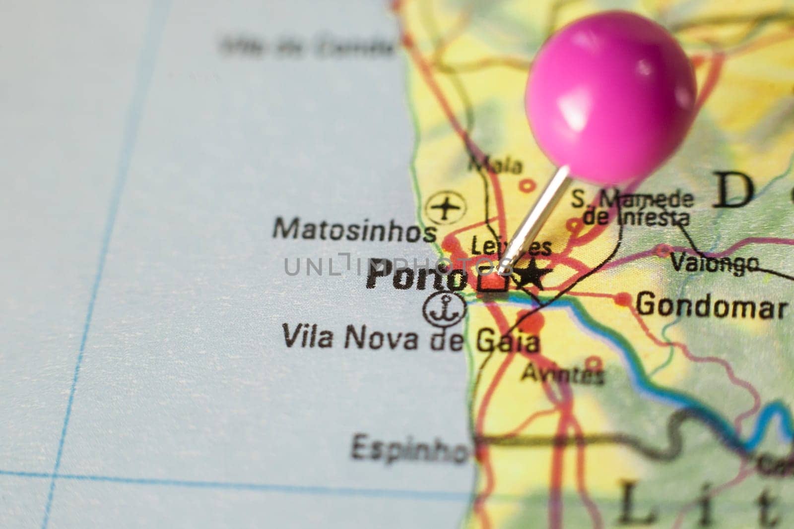 Pushpin marking on Porto, Portugal. Selective focus on city name