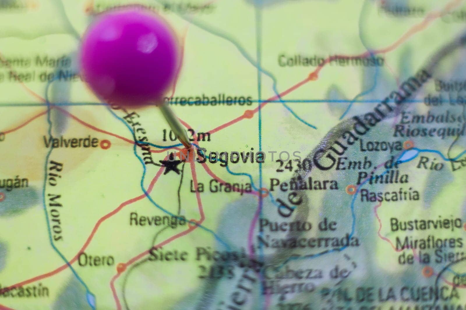Pushpin marking on Segovia, Spain. Selective focus on city name