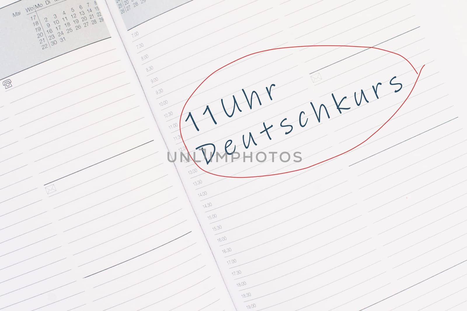 The words german course at 11 o´clock are standing in the german language in the calendar, education and integration concept