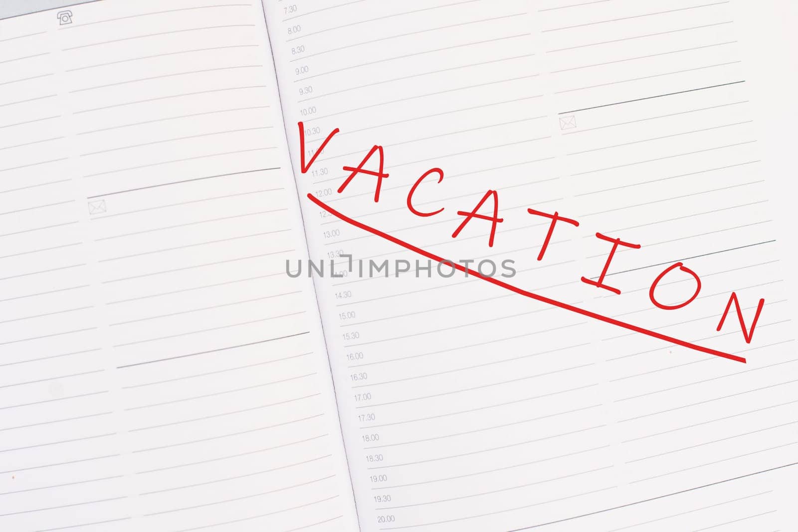 The word vacation is standing in the calendar, planning for the holiday, summer break