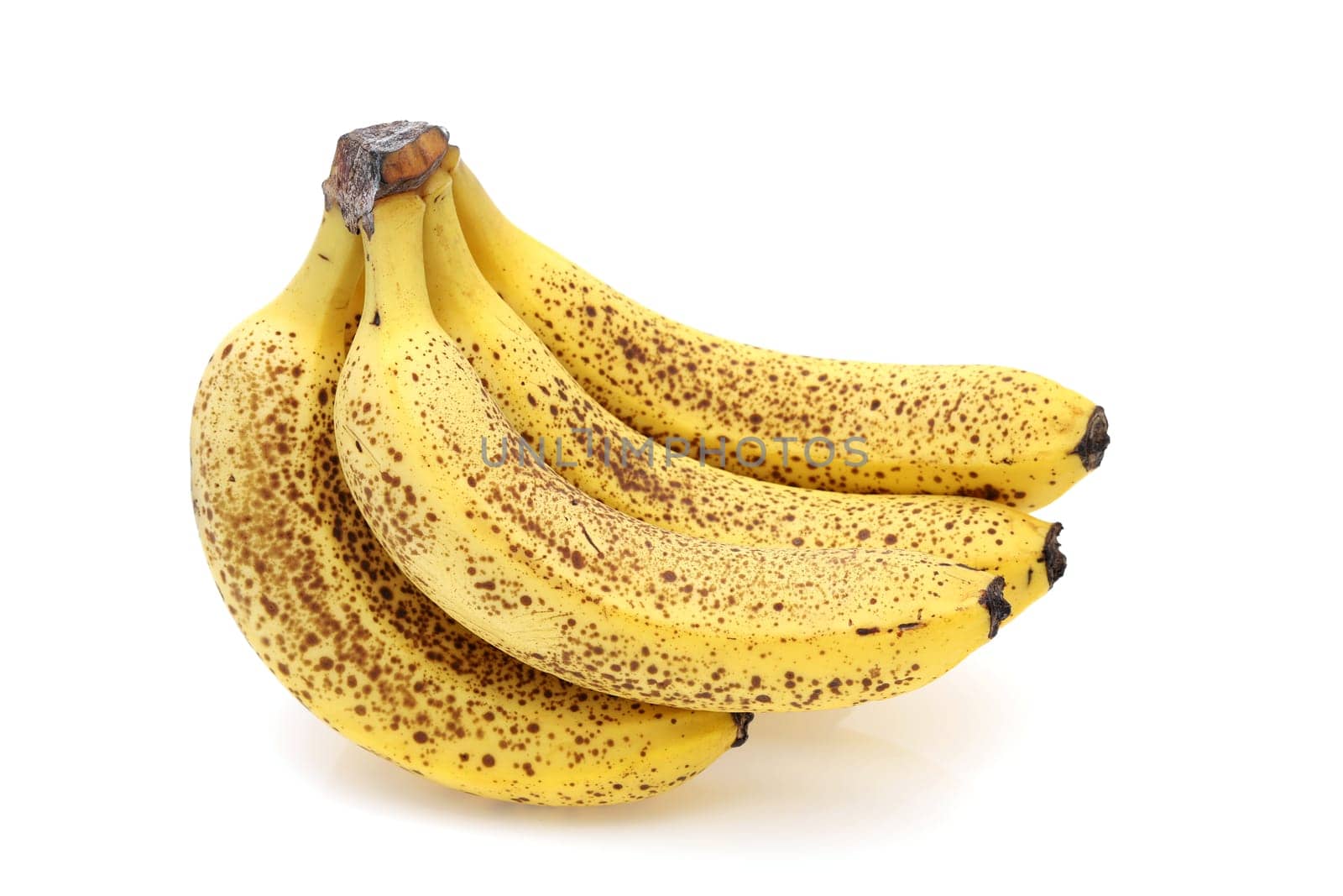 Close up of over-ripe bananas isolated on white background