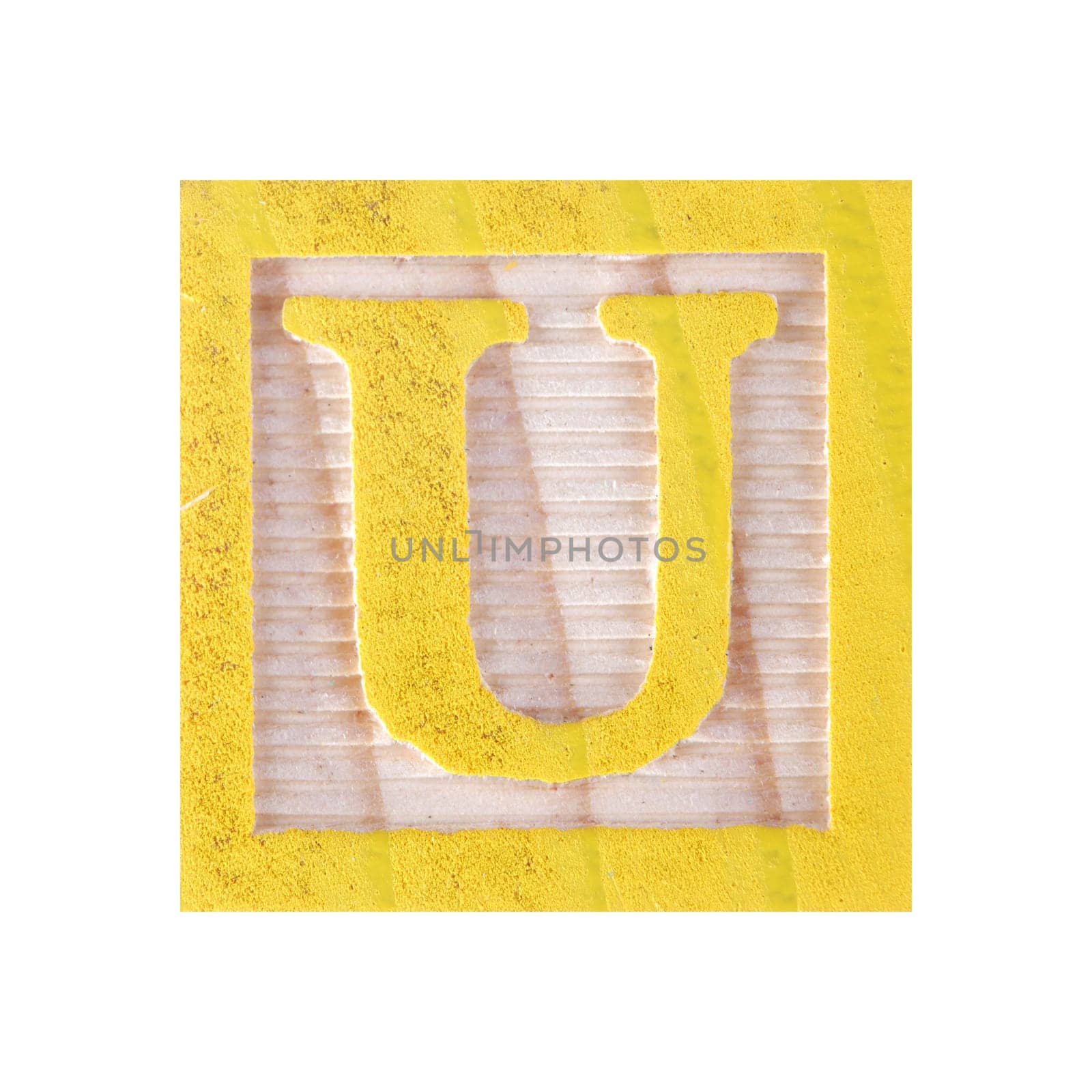 A Letter U childs wood block on white with clipping path