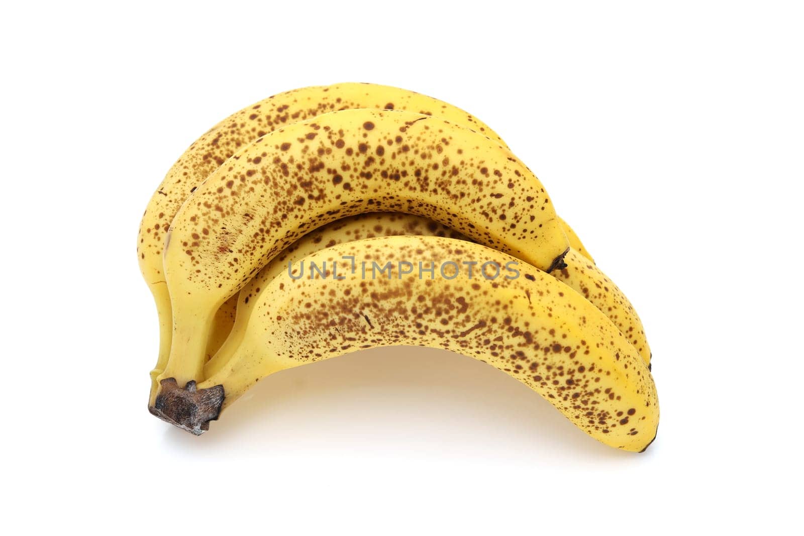 Close up of over-ripe bananas isolated on white background