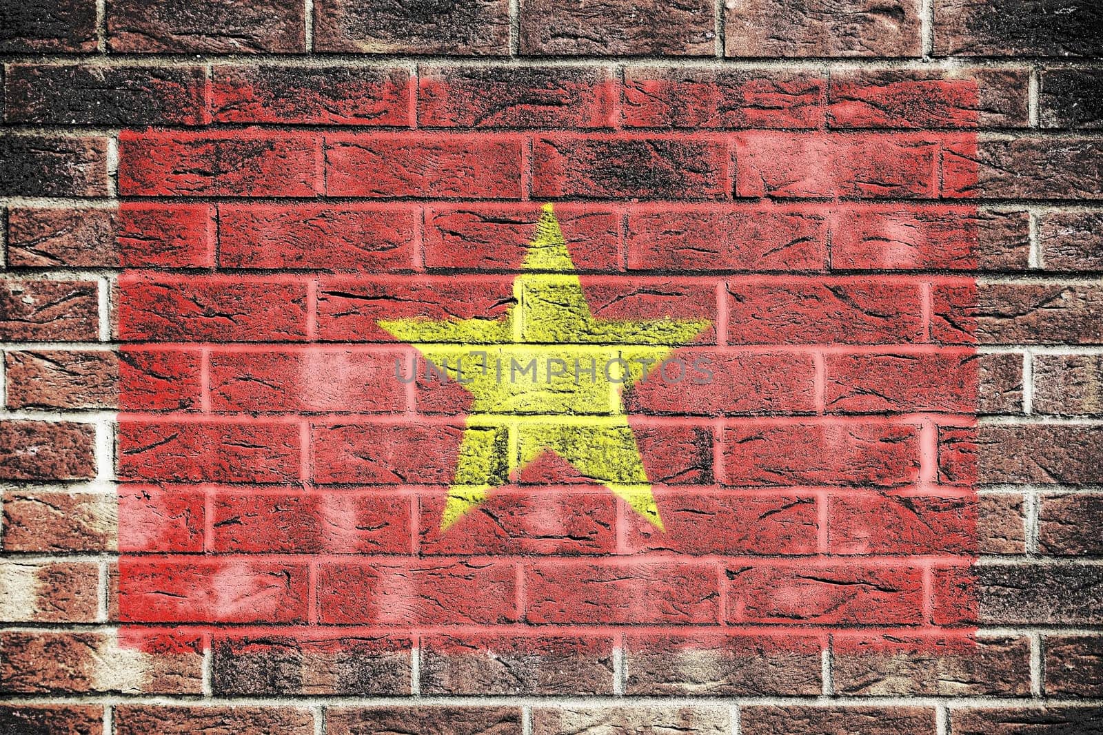 A Vietnam flag on a brick wall background
