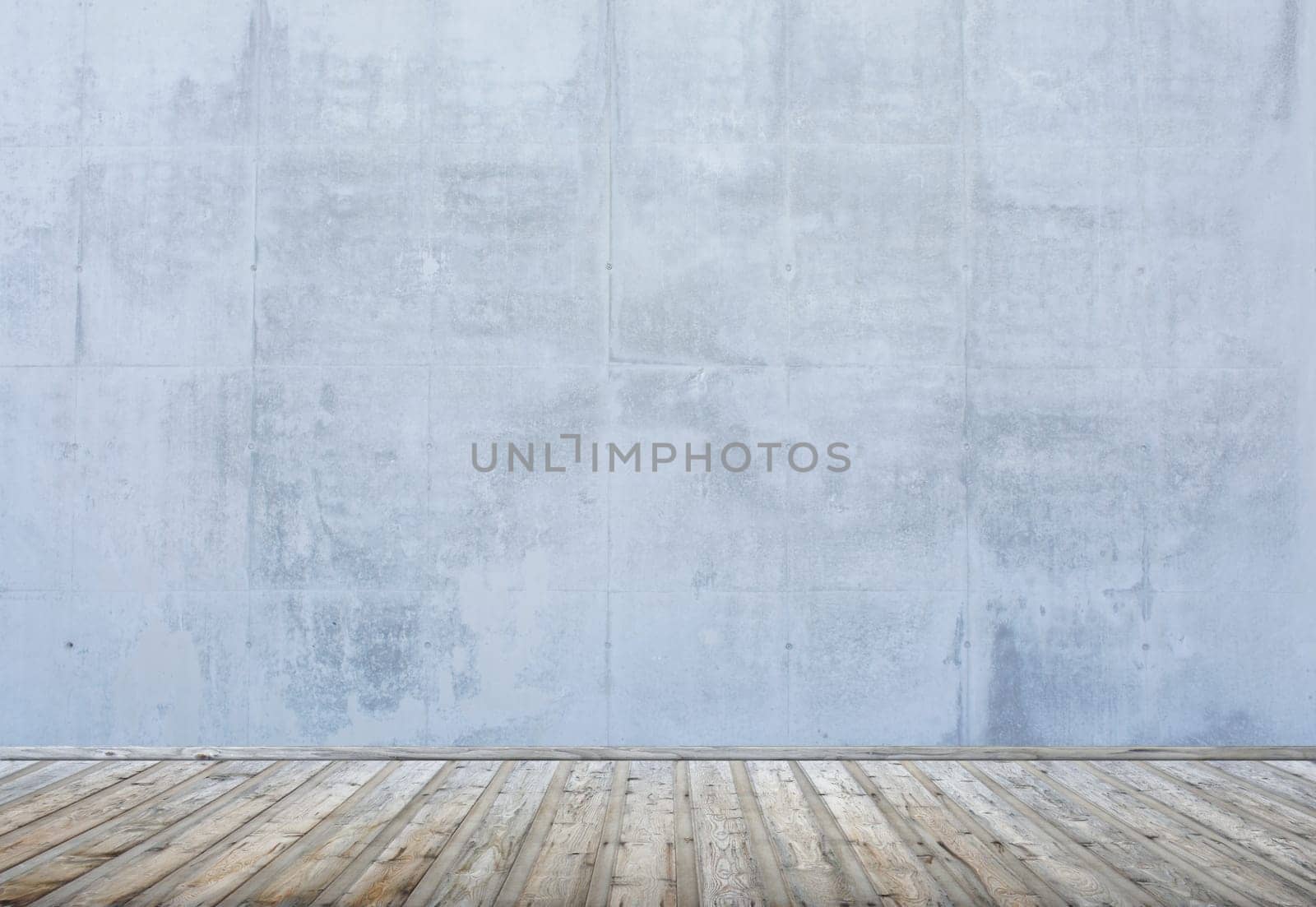 Empty room or loft with wooden floor and concrete wall