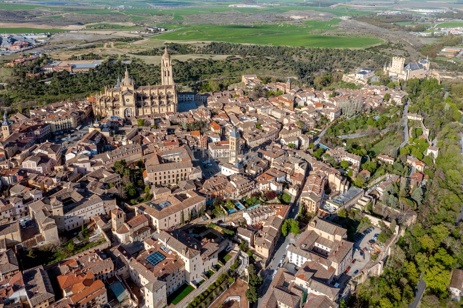 View of the Alcazar fortress and St Mary cathedral of segovia, listed world Heritage center by UNESCO Panoramic aerial view