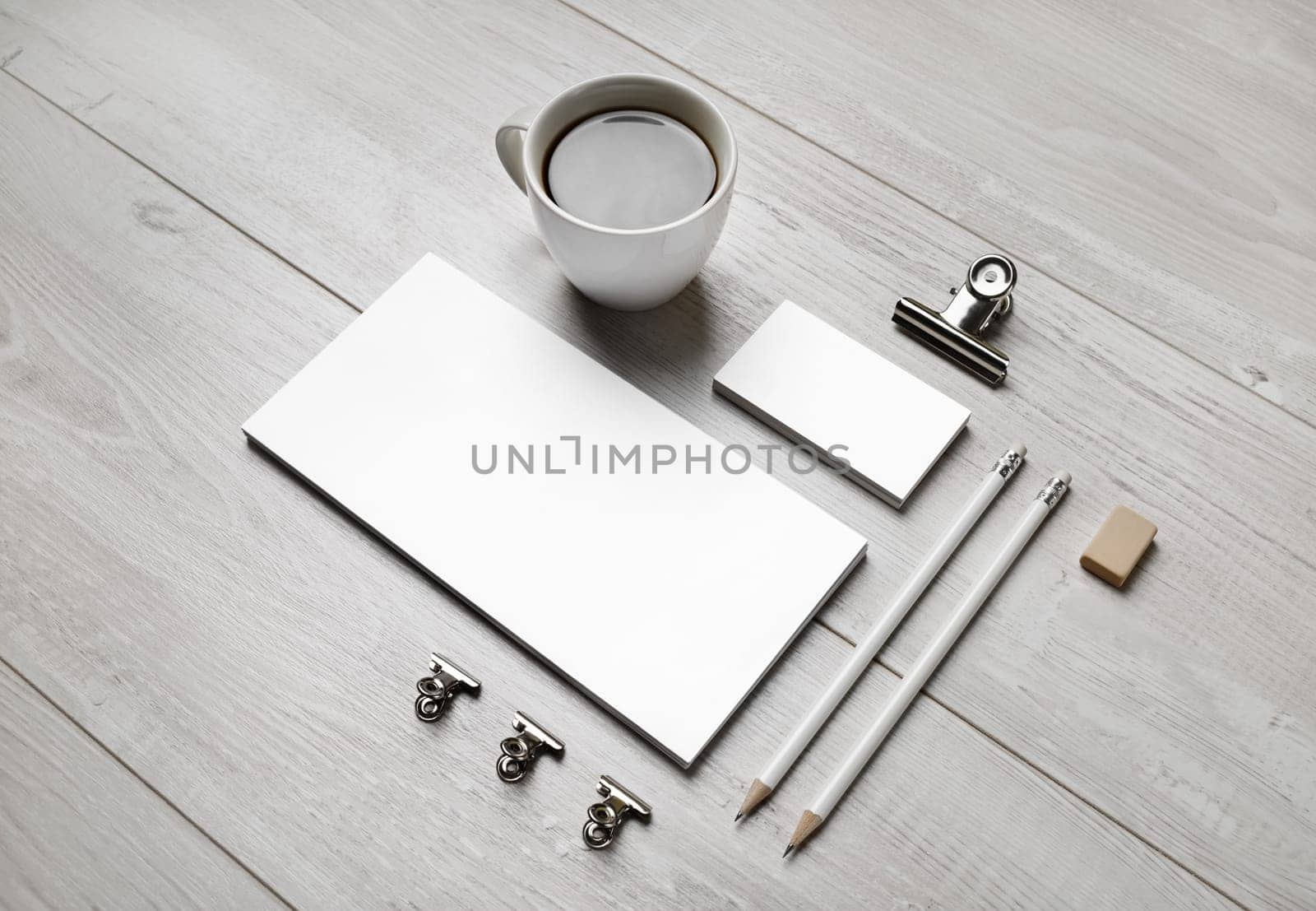 Blank stationery set on light wooden background. ID template. Mockup for branding identity for designers.