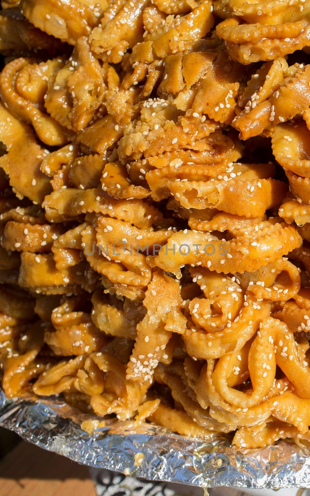 Platter crammed with chebakia. Deep-fried moroccan pastry