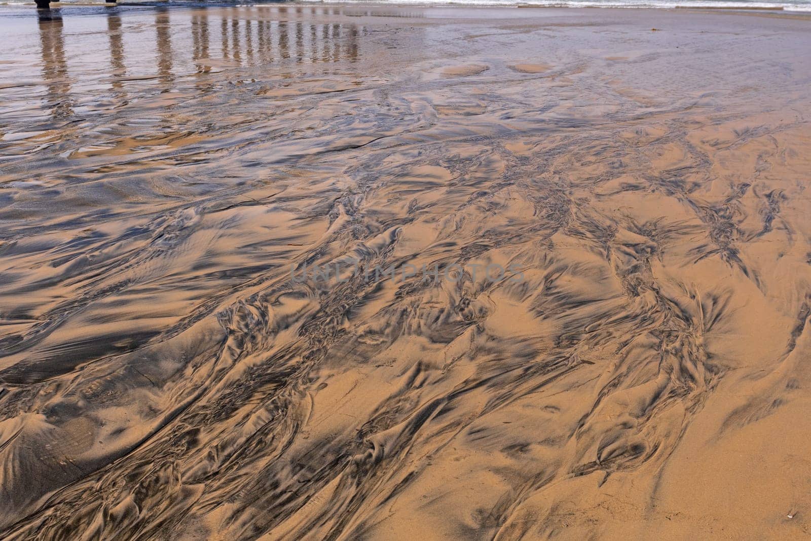 Colorful Sand Where Water Flows to the Ocean in La Jolla, California