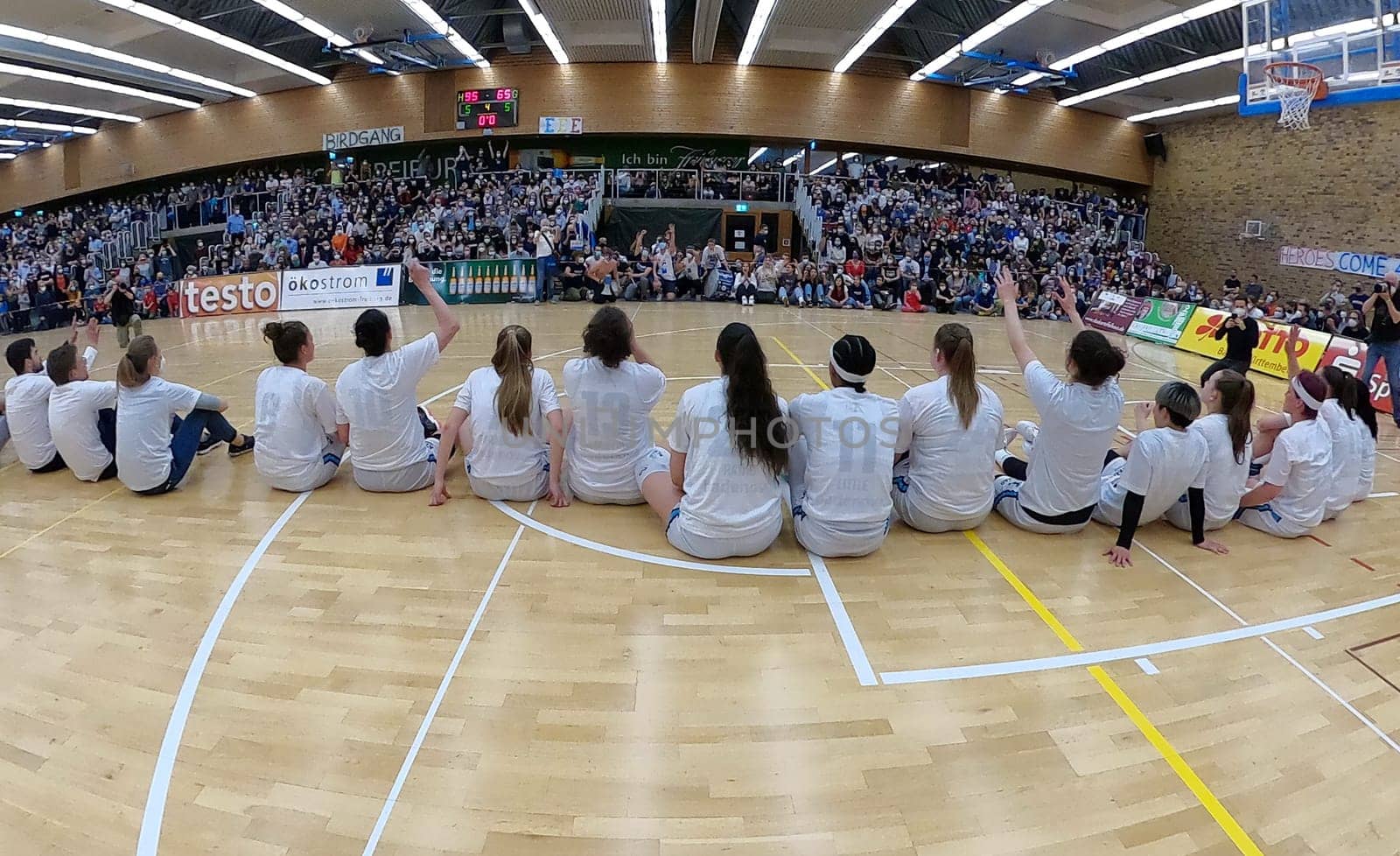 Sit and celebrate with the fans after winning the German Championship and the fourth game of the 1.BBL Ladies 2021/2022 - Eisvoegel USC Freiburg - Rheinland Lions. .. Photo: Joachim Hahne/johapress