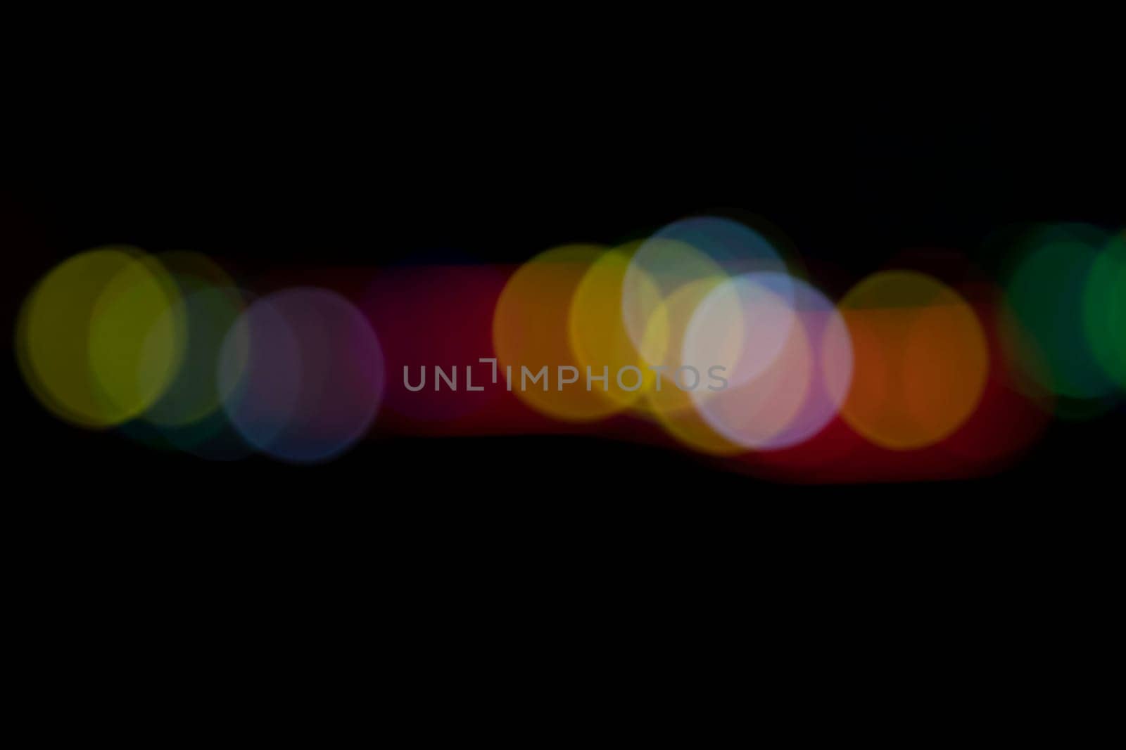 Black background with colorful light effects. background with  Blur bokeh effects. Abstract background texture