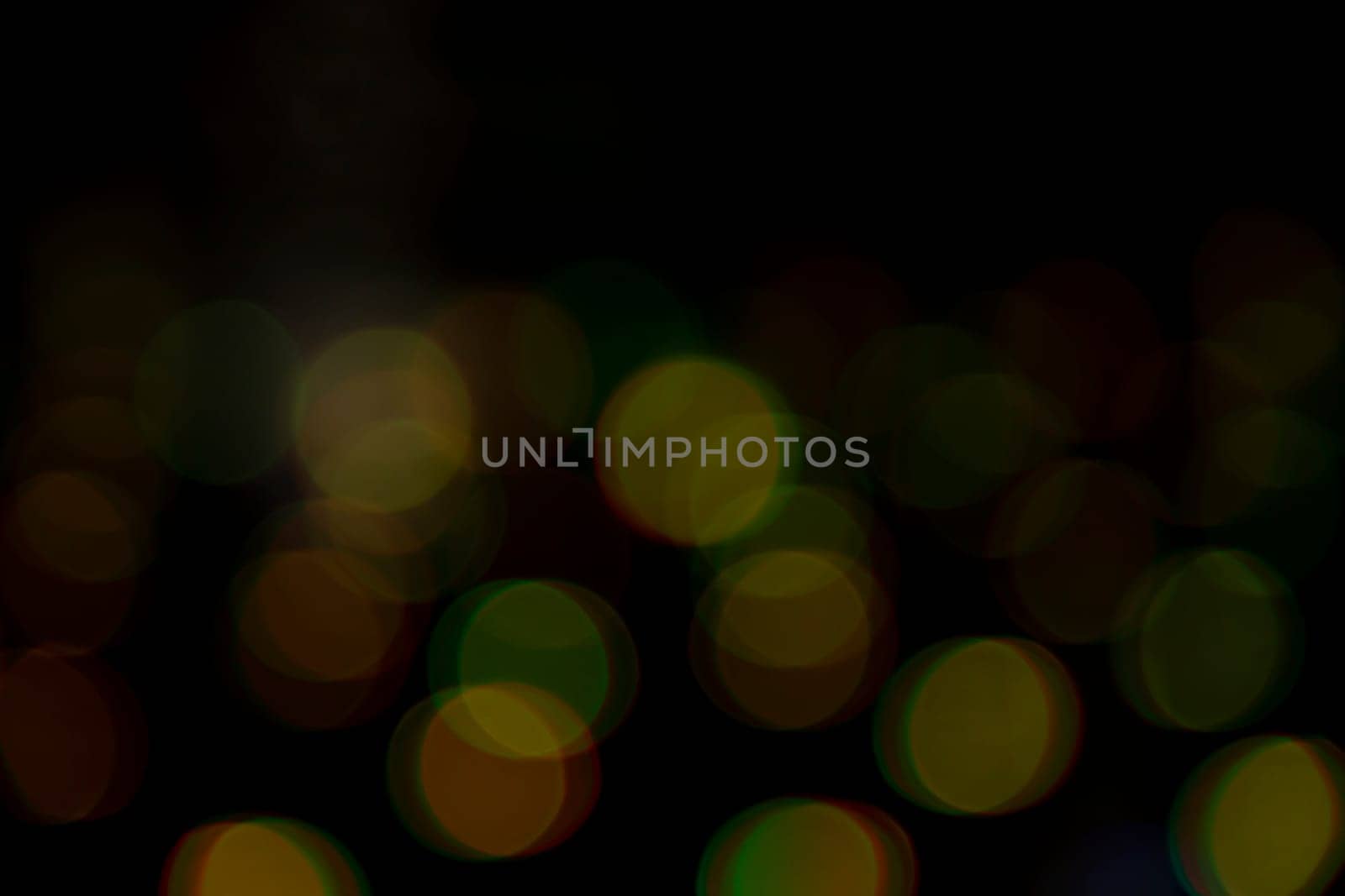 Abstract bokeh light effects on the night. Black background with colorful light effects. background with  Blur bokeh effects. Abstract background texture