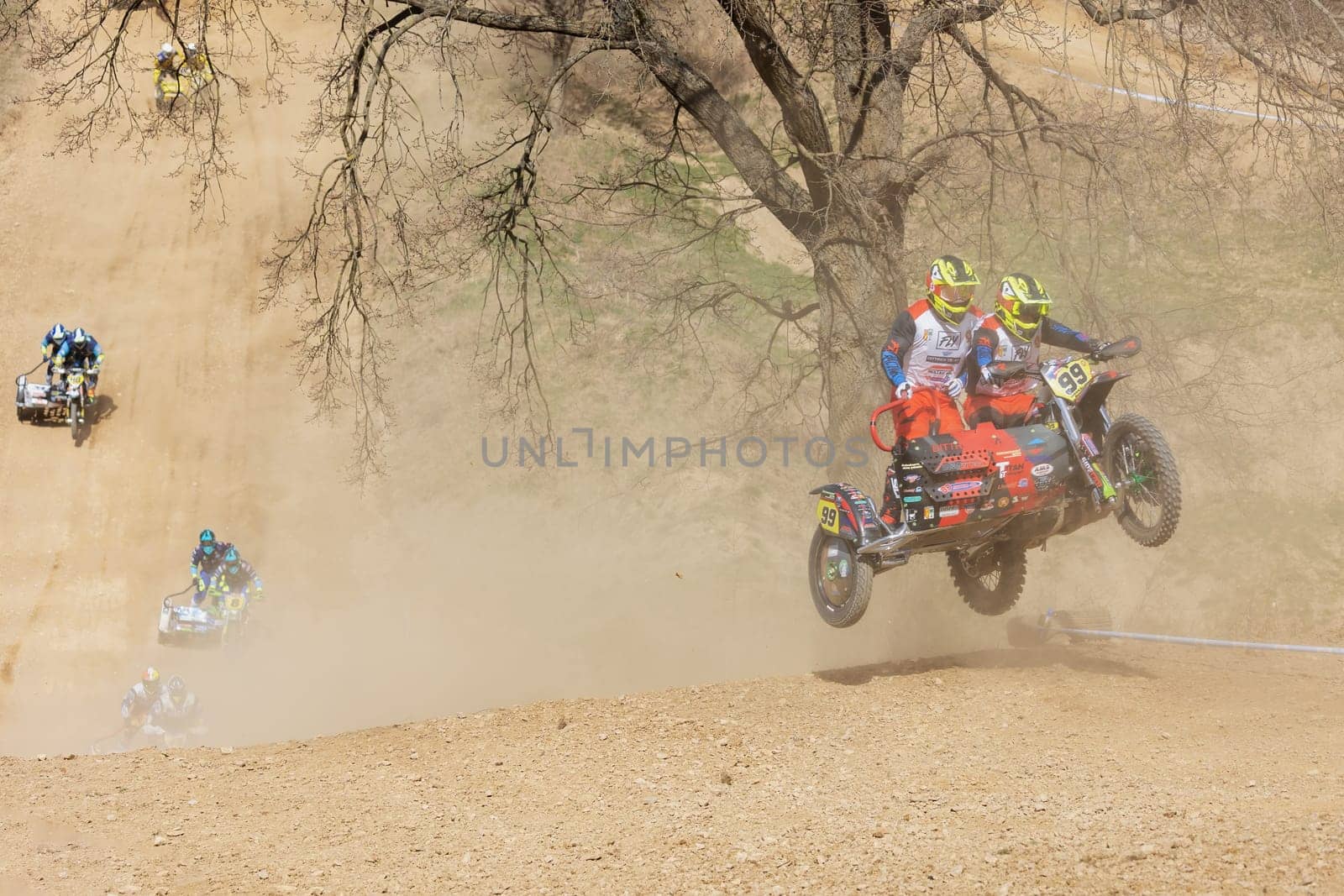 MOHELNICE, CZECH REPUBLIC - APRIL 16, 2022. Group of motorbike in the race in the "Sidecarcross Championship of Czech Republic"" on April 16, 2022 in the town of Mohelnice, Czech Republic."