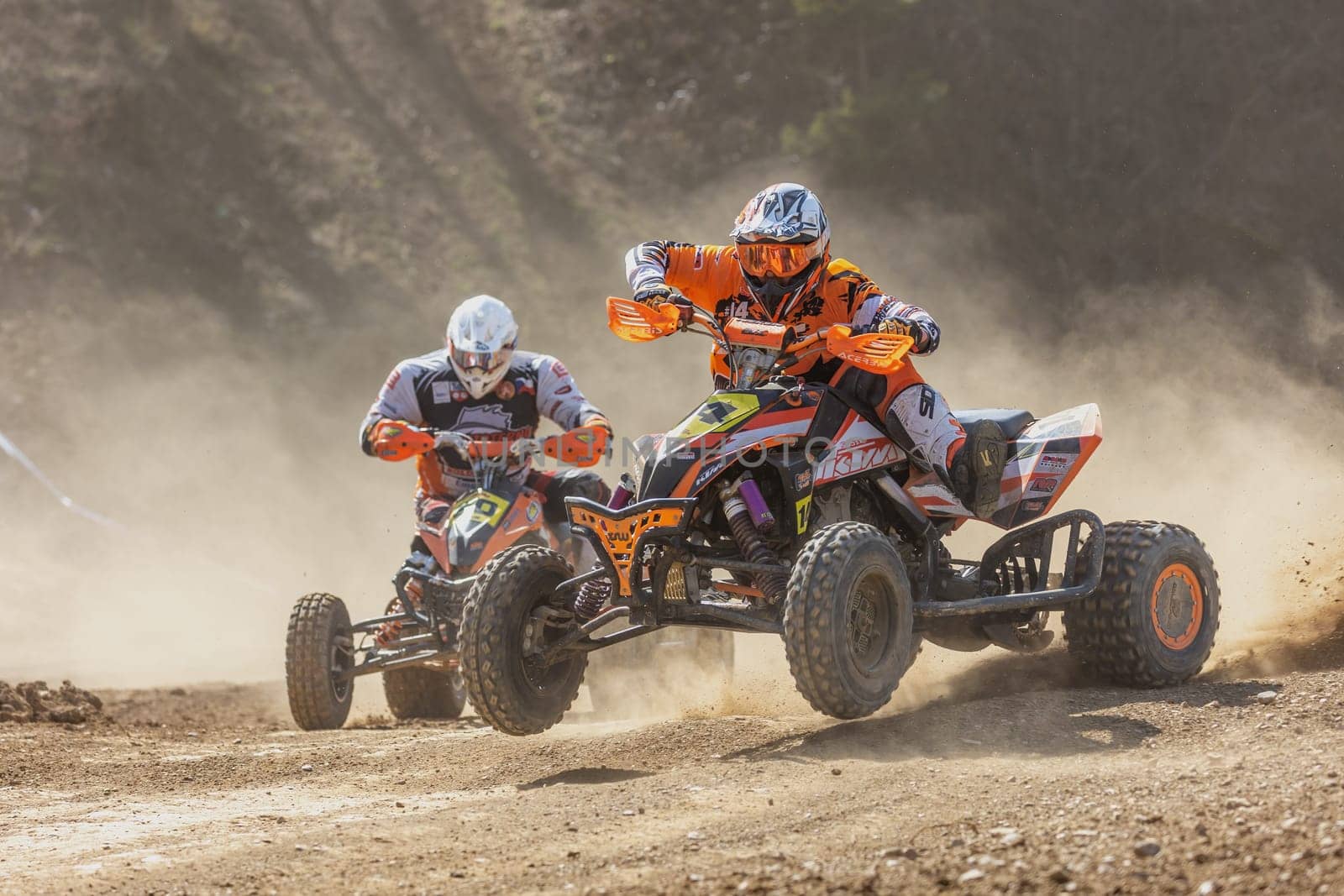 MOHELNICE,  CZECH REPUBLIC - APRIL 16, 2022: Quad bike rider jumping in the turn  in International Championship of Czech Republic in Sidecarcross, category Quad on April 16, 2022 in Mohelnice.
