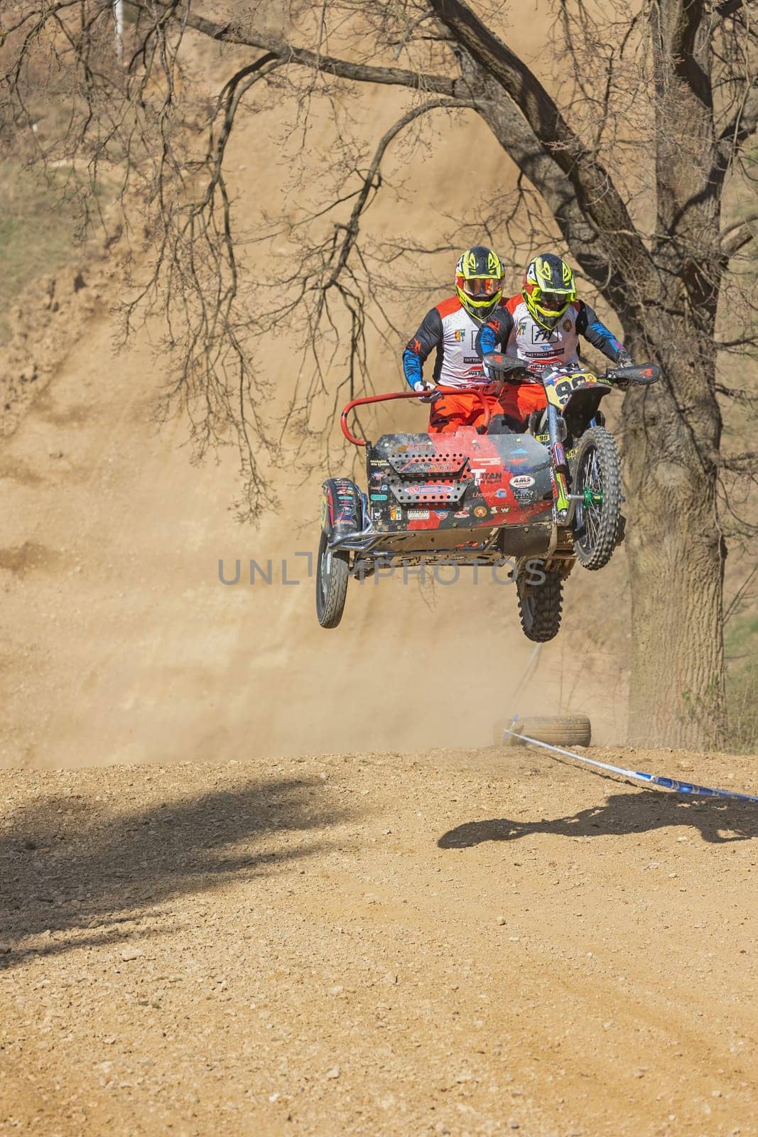 MOHELNICE, CZECH REPUBLIC - APRIL 16, 2022. Unidentified racers rides a sidecar in the "Sidecarcross Championship of Czech Republic"" on April 16, 2022 in the town of Mohelnice, Czech Republic."