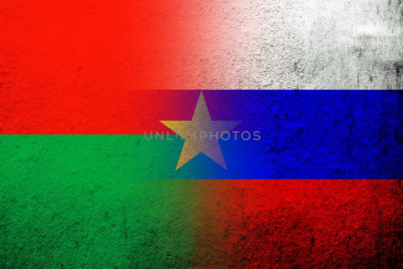 National flag of Russian Federation with National flag of Burkina Faso. Grunge background