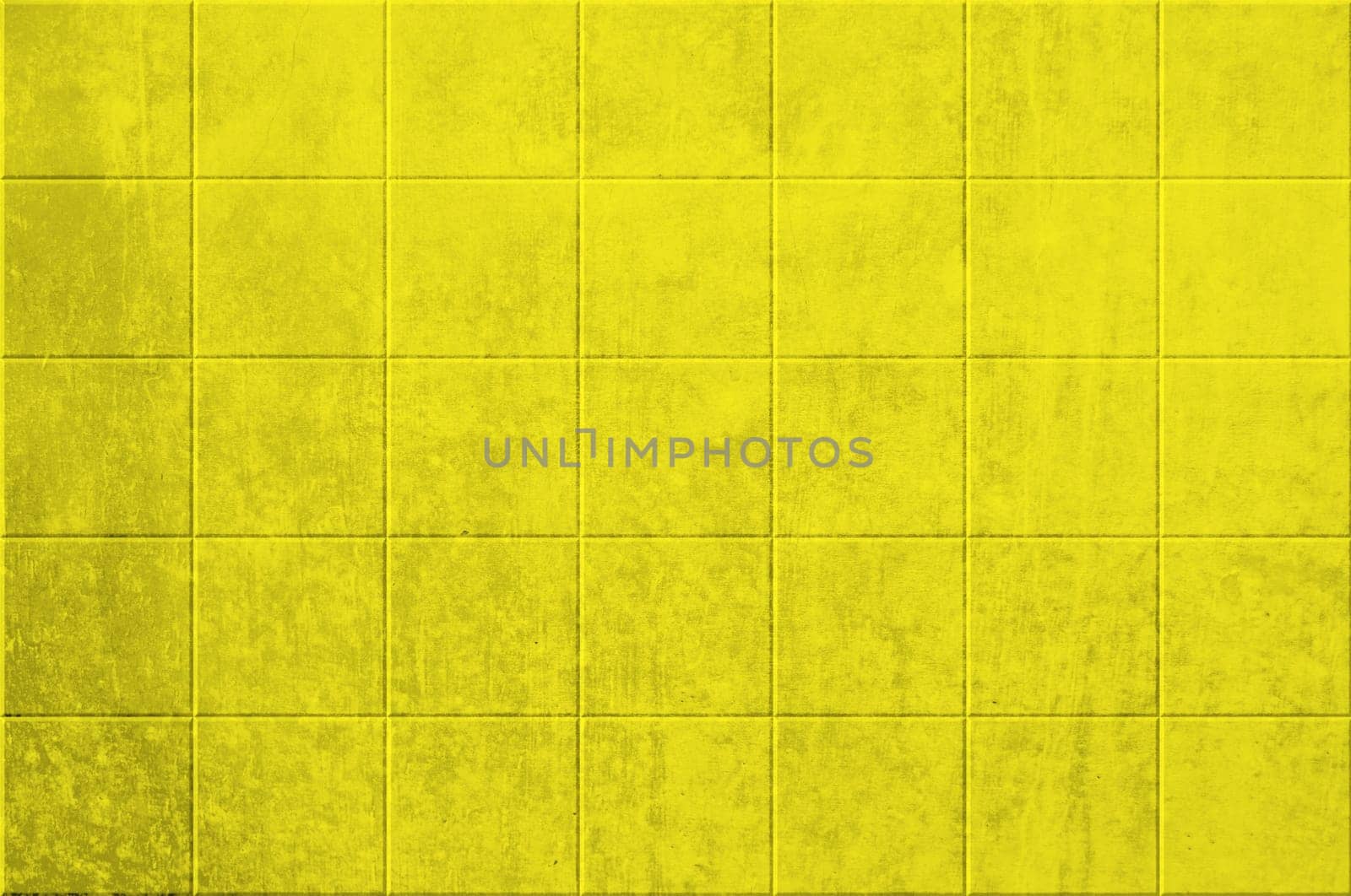 Dirty wall background with yellow tiles