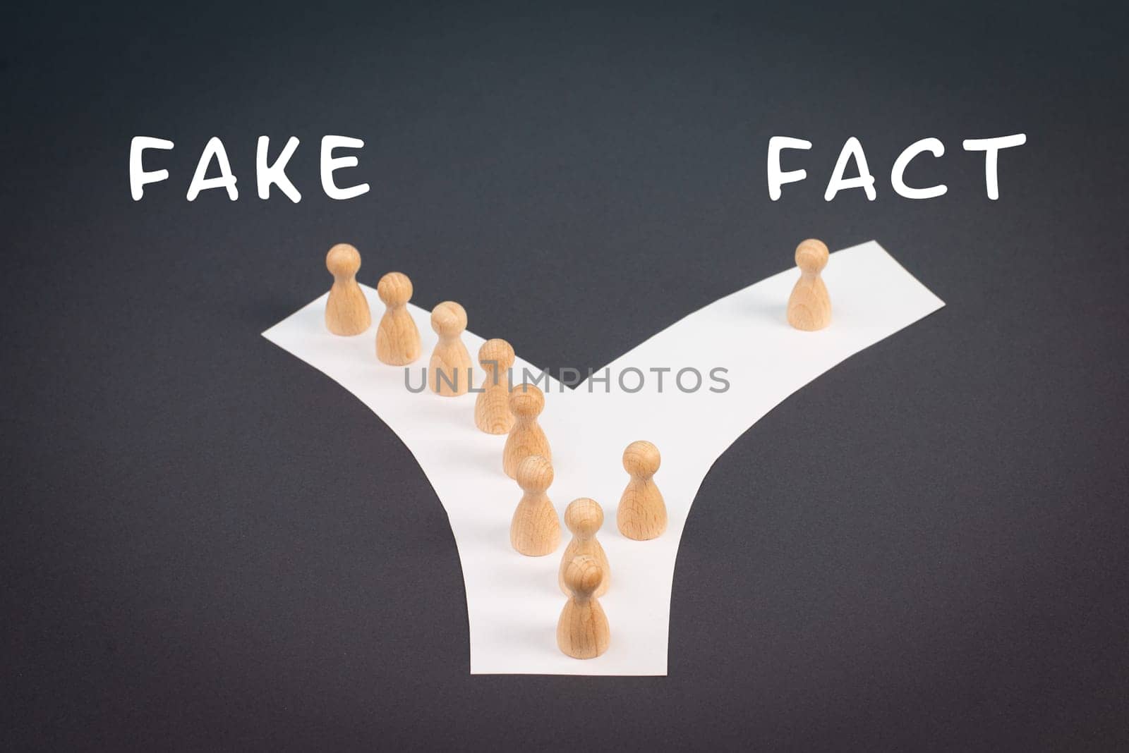 Crowd of people follow the path to the fake information, one thinks different and takes his own way and decisions, propaganda and conspiracy theory concept, media and manipulation issue
