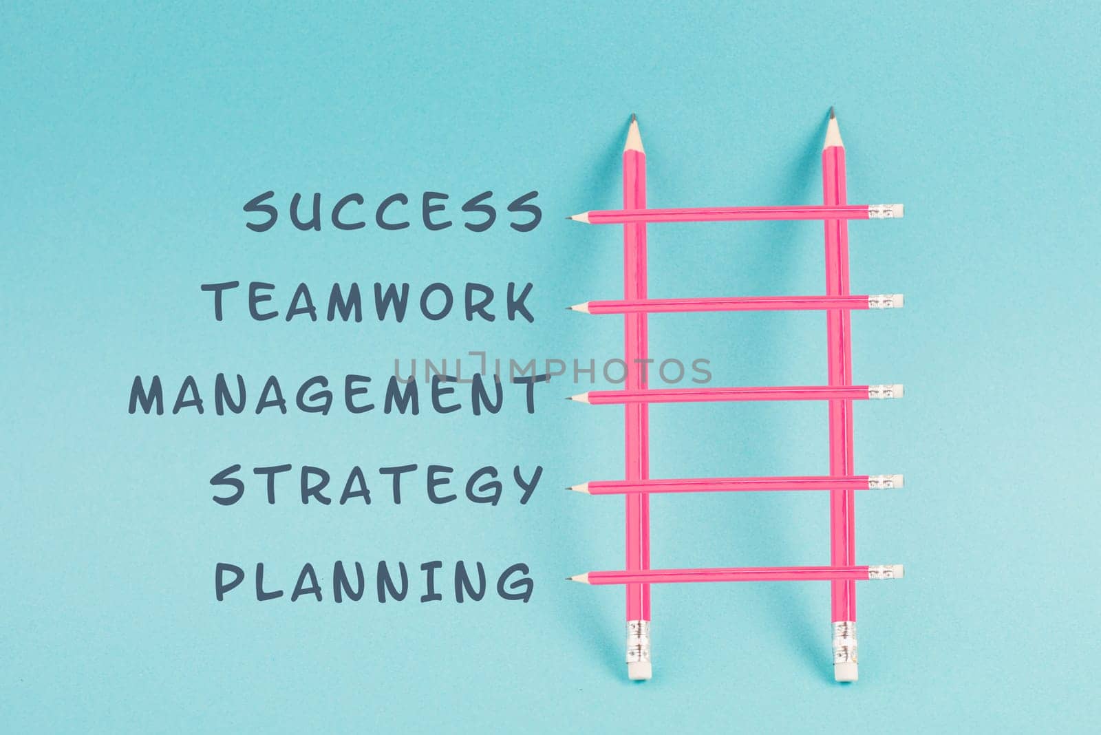 Ladder of success build with pencils, planning a strategy, teamwork for success step by step concept, progress in business and education, have a goal
