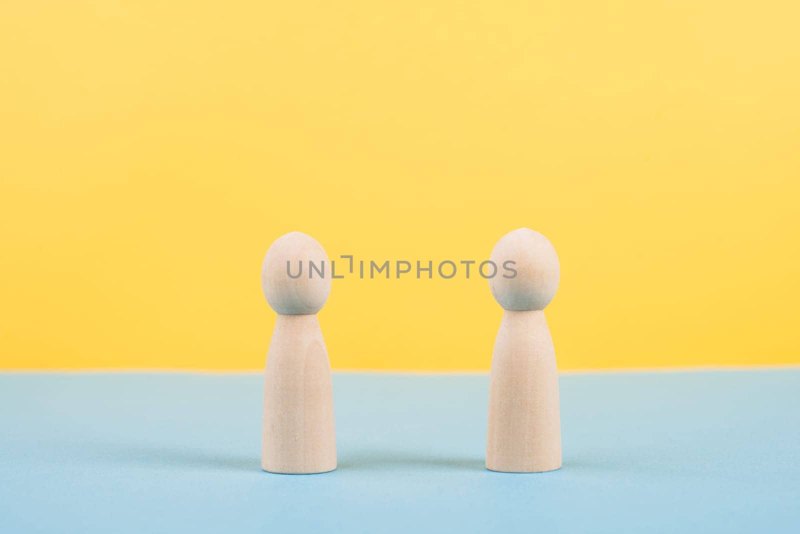 Two people talking together, having a conversation, networking and teamwork concept, social issue