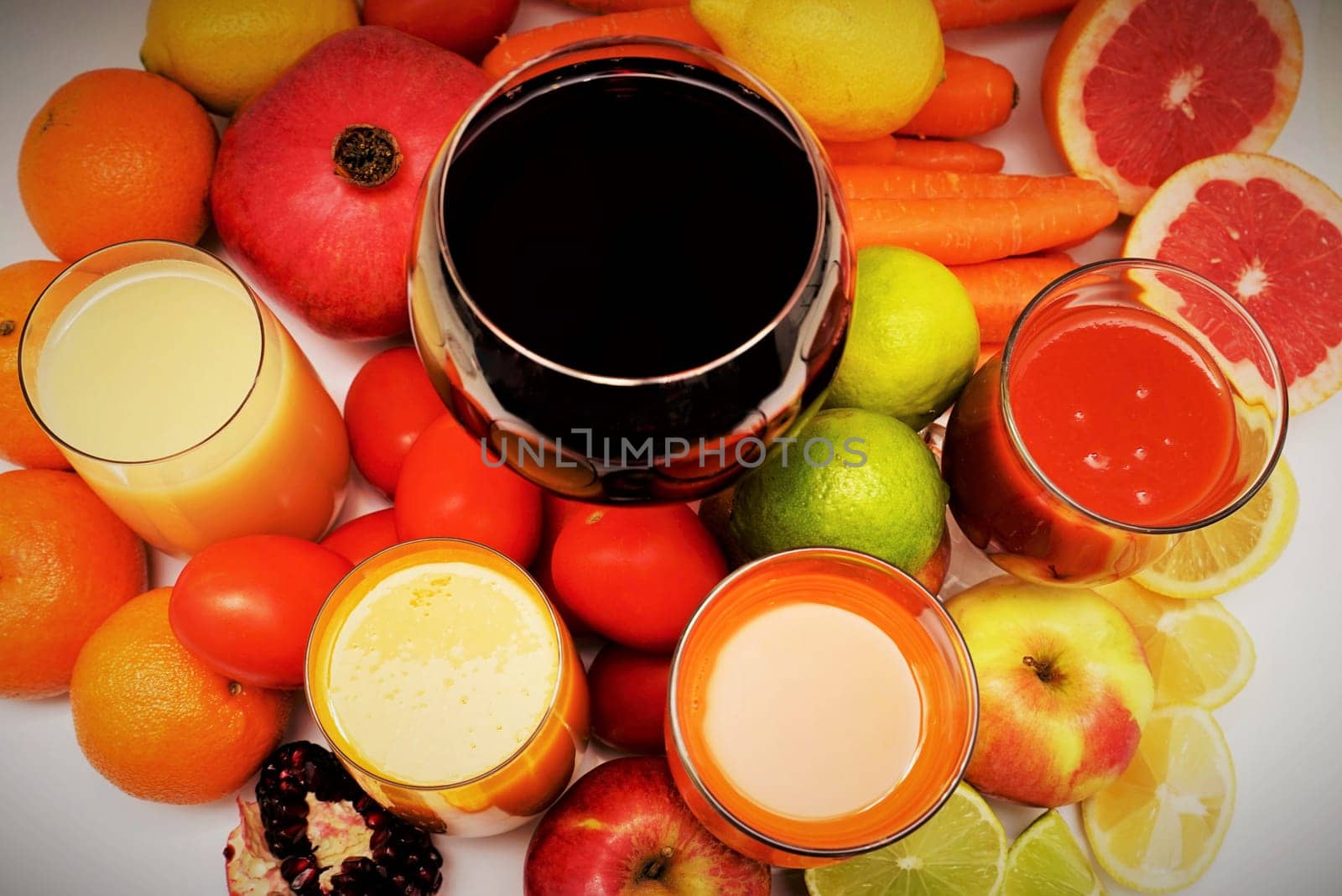 Healthy fruit and vegetable juices on a white background