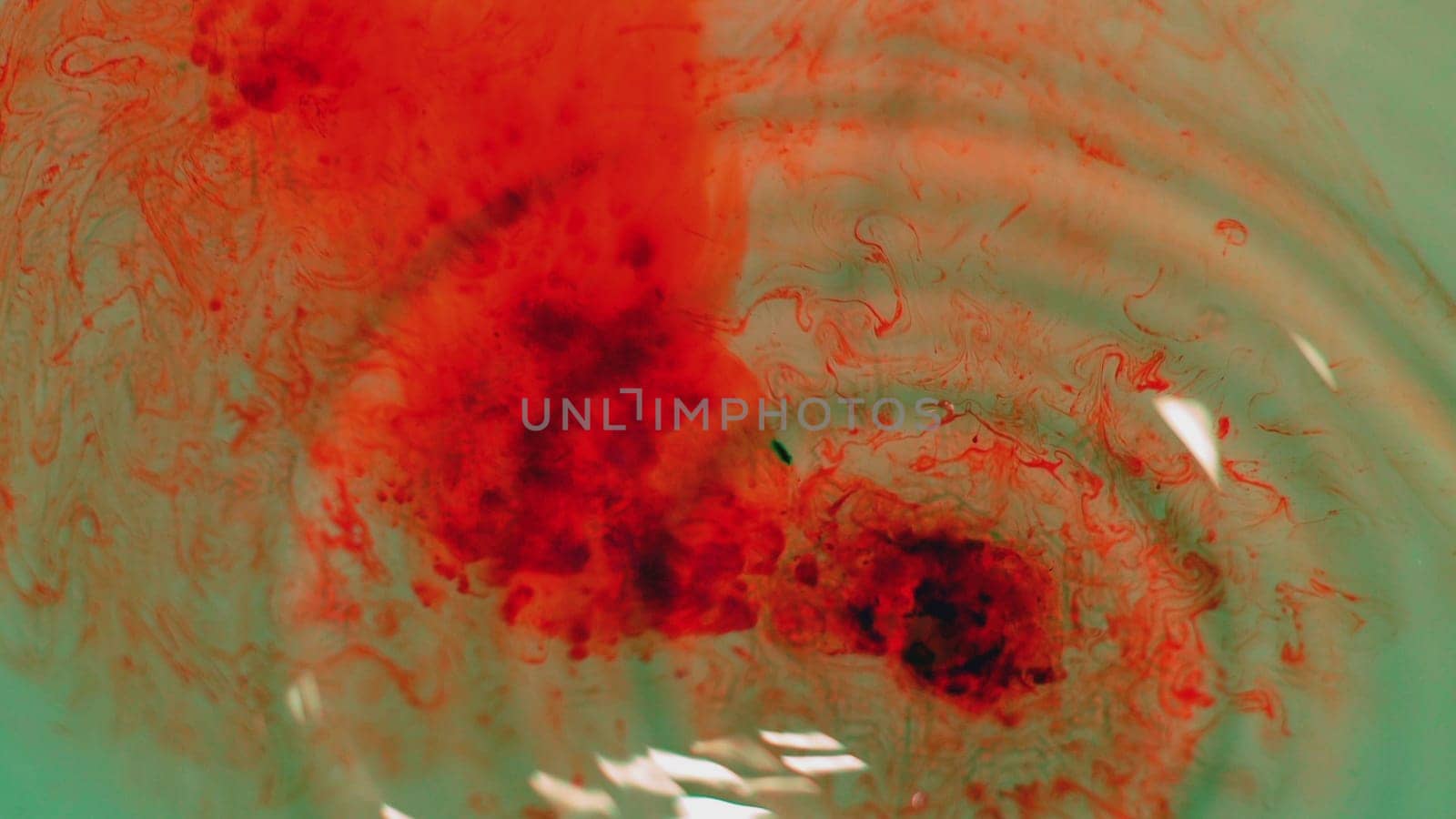 Blood Drops Flowing In Water