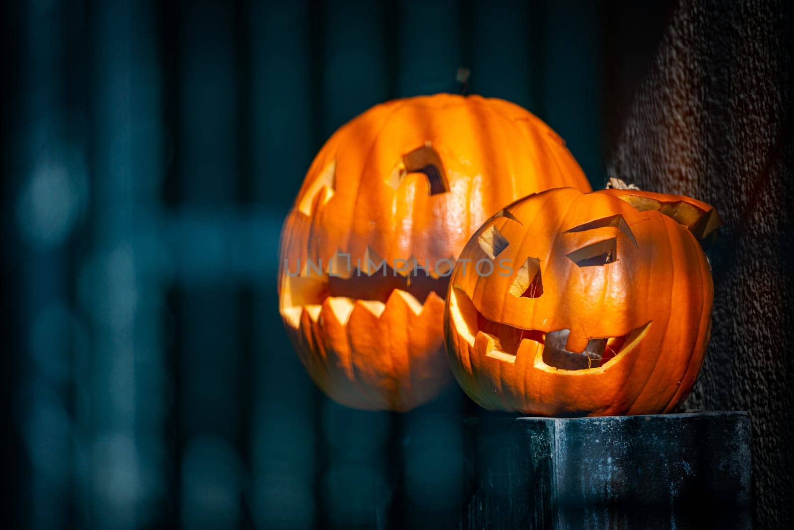 Two pumpkins carved for Halloween celebraiton in street of San Francisco, California, United States of America.
